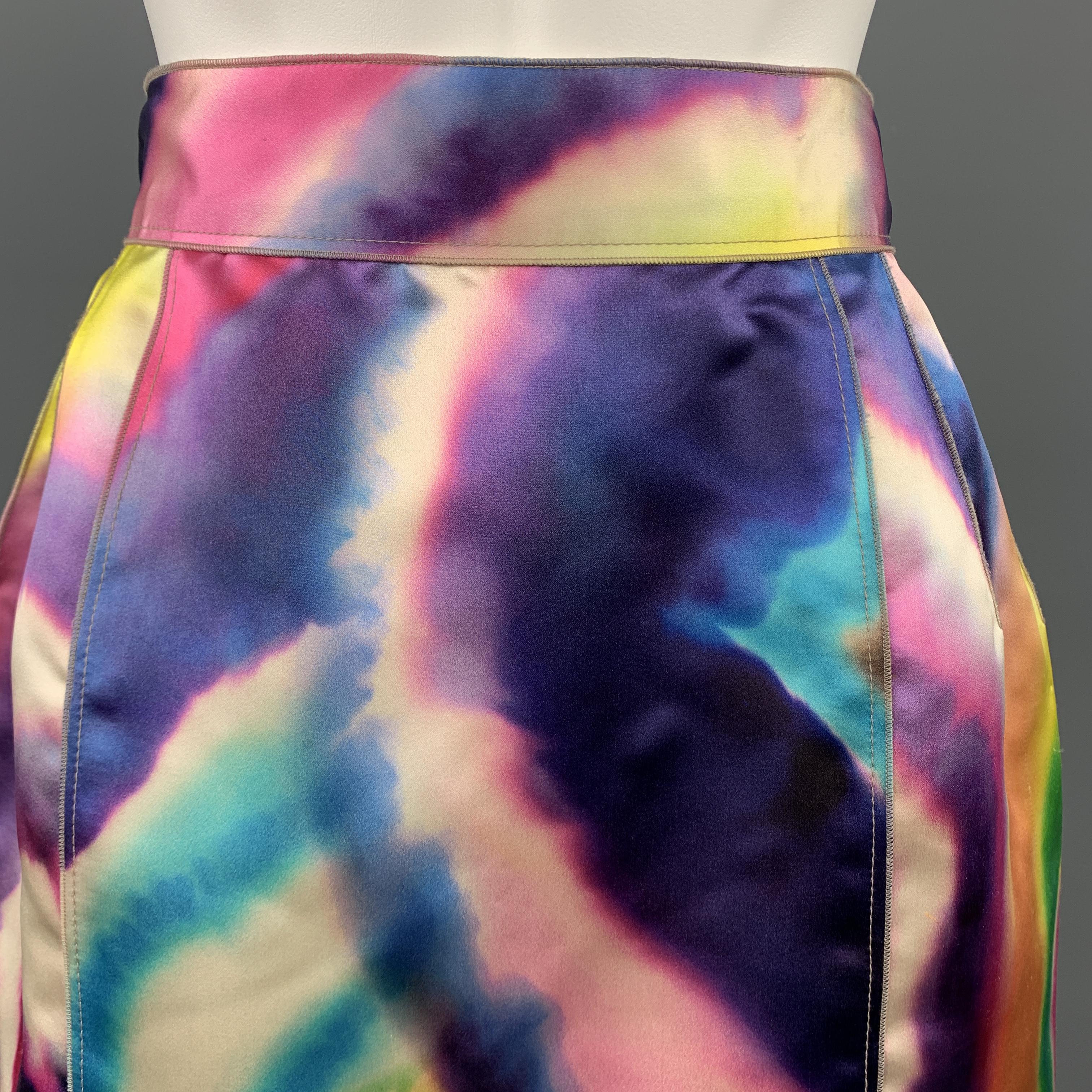 DOLCE & GABBANA mini skirt comes in a multi color water color print silk satin with a high rise and exposed back zip. Marks on front. As-is. Made in Italy.

New with Defect.
Marked: IT 38

Measurements:

Waist: 25 in.
Hip: 40 in.
Length: 16.5 in. 