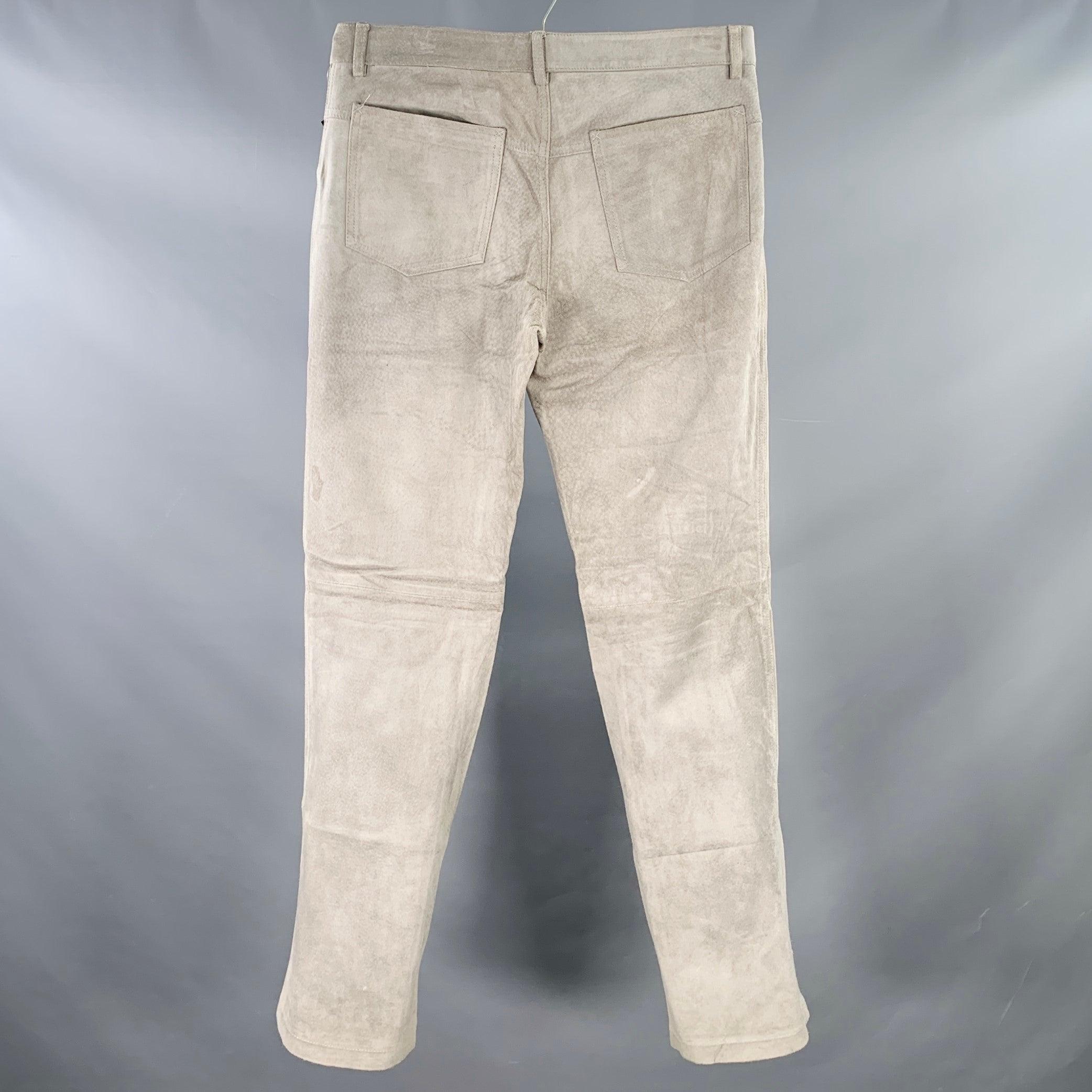 DOLCE & GABBANA casual pants
in a grey suede featuring five pockets, straight leg, and zip fly closure. Made in Italy.Good Pre-Owned Condition. Signs of wear on seat of pants, minor marks. 

Marked:   IT 48 

Measurements: 
  Waist: 32 inches Rise: