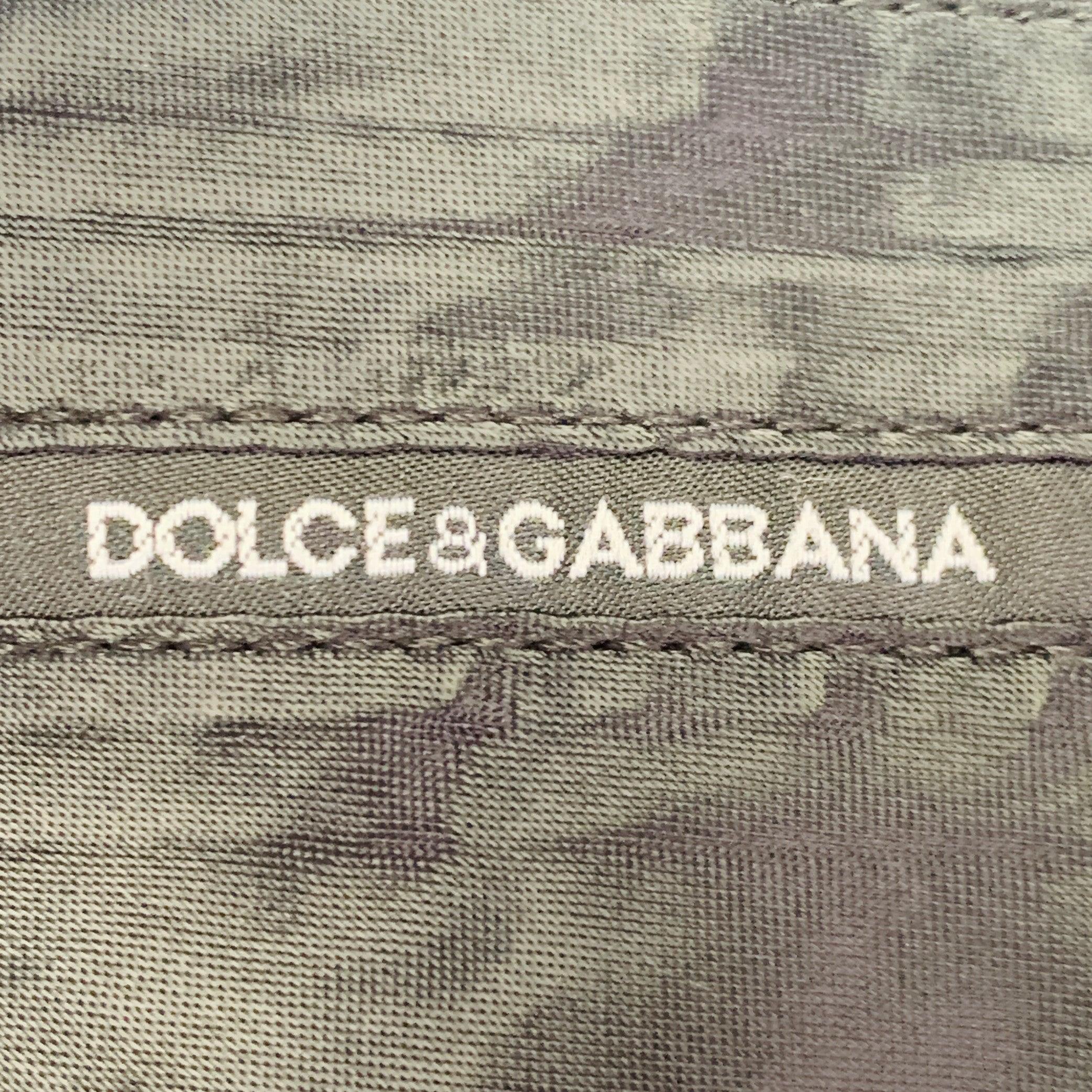 Dolce & Gabbana Taille 34 Pantalon habillé noir en laine avec fermeture éclair. Bon état - En vente à San Francisco, CA