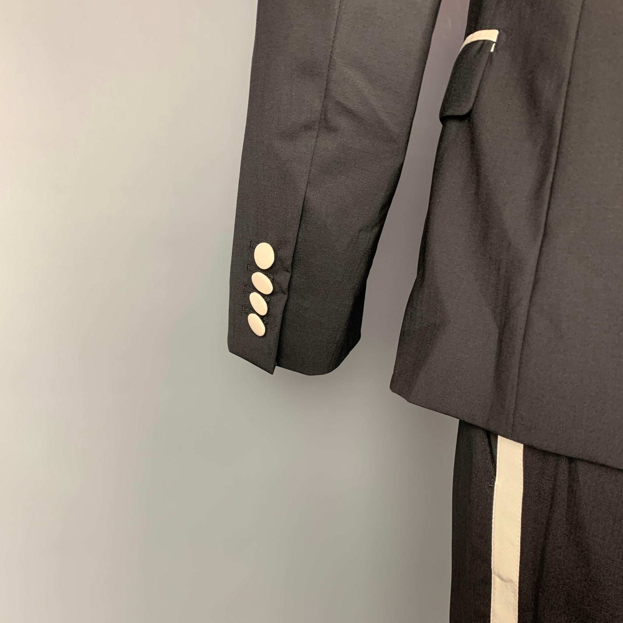 black suit with gold trim