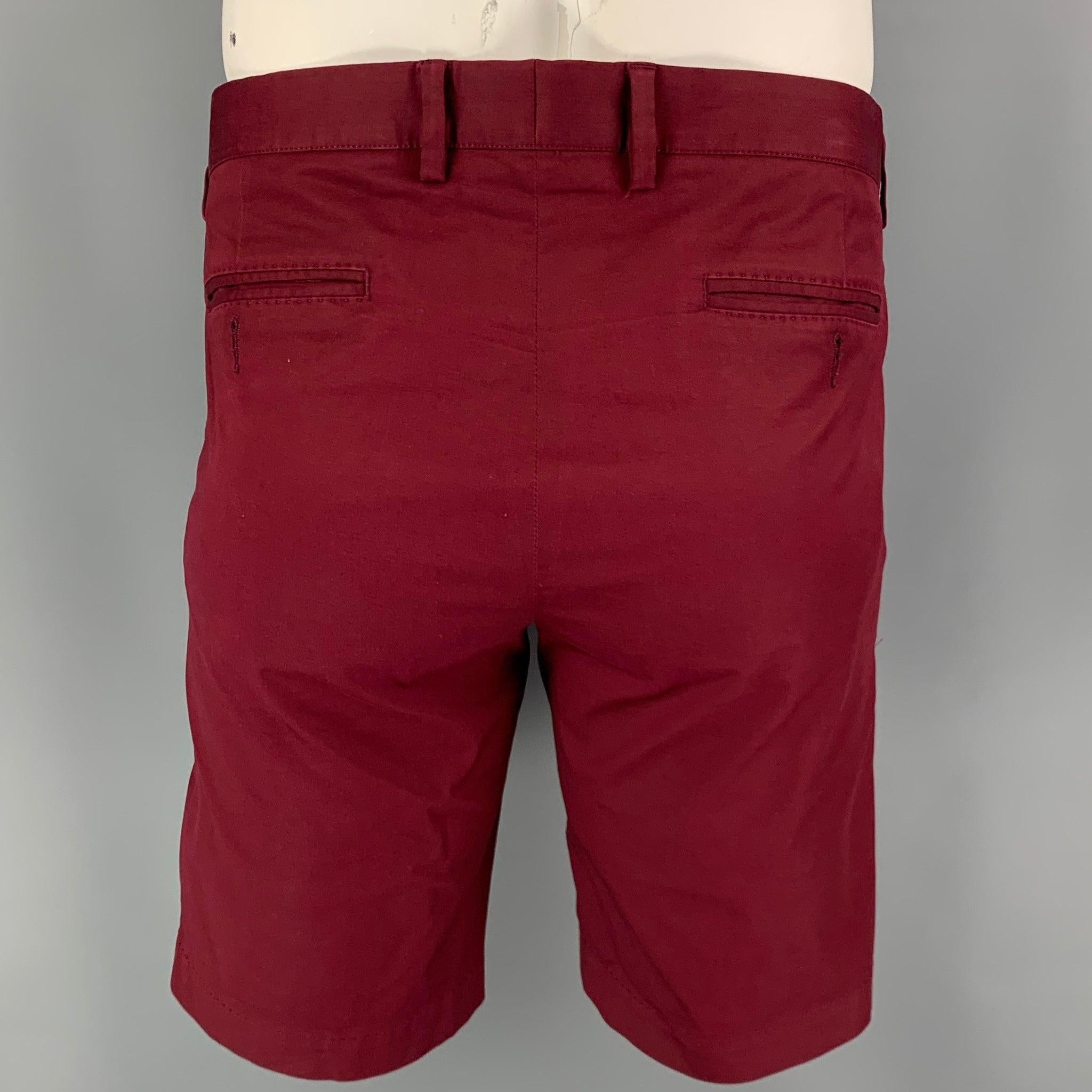 DOLCE & GABBANA shorts comes in a burgundy cotton featuring a chino style and a zip fly closure. Made in Italy.
Excellent
Pre-Owned Condition. 

Marked:   52 

Measurements: 
  Waist: 36 inches Rise: 9 inches Inseam: 10 inches Leg Opening: 20 inches