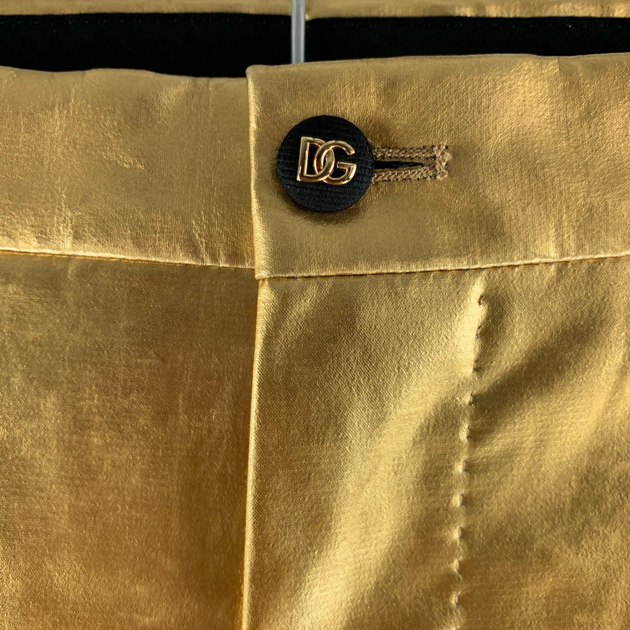 D&G by DOLCE & GABBANA dress pants comes in a gold tone polyamide and elastane material featuring a jeans cut, slit pockets, and a zipper fly closure. Made in Italy.Excellent Pre- Owned Condition. 

Marked:   52 

Measurements: 
  Waist: 37 inches