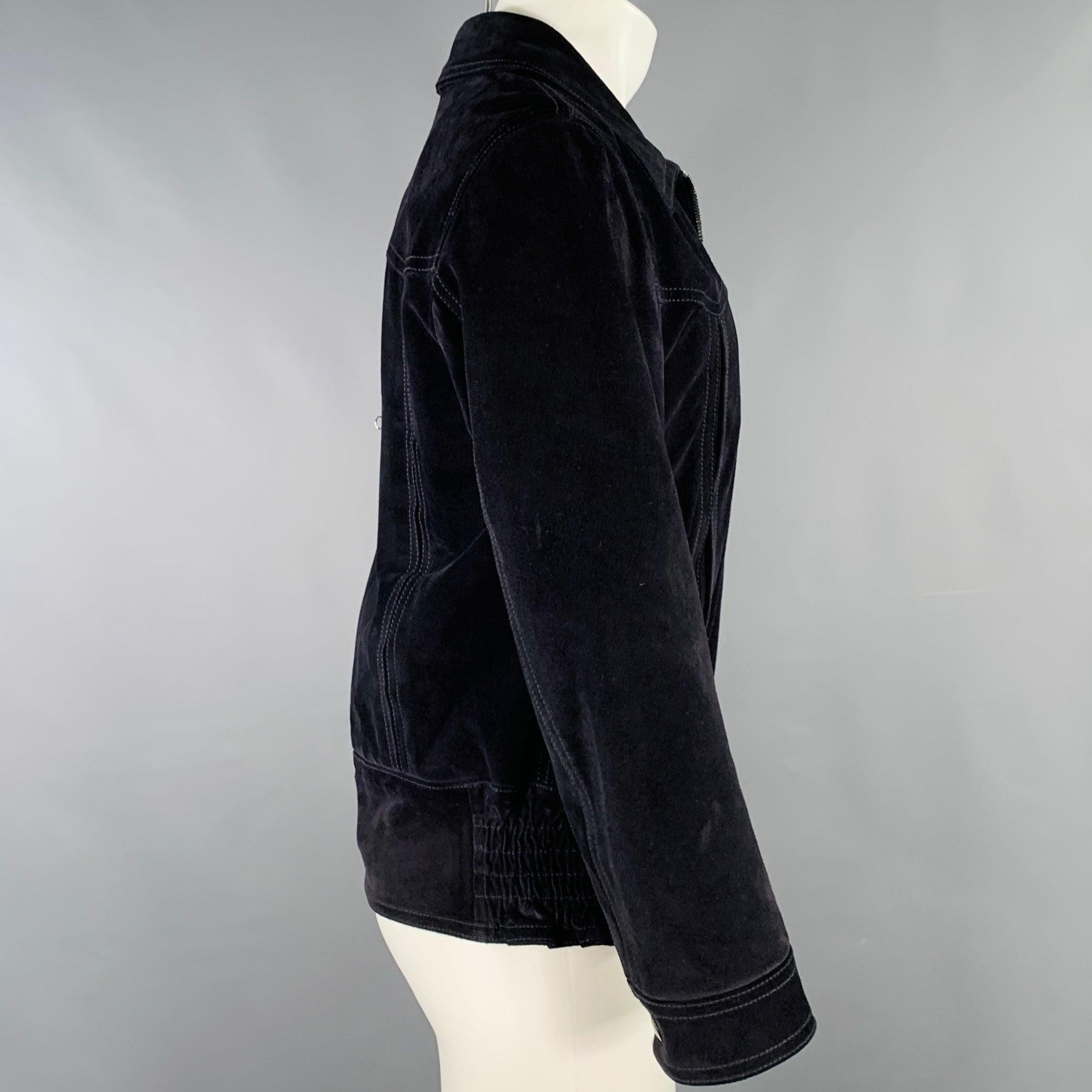 DOLCE & GABBANA jacket
in a black calfskin suede featuring a work jacket style, two slit pockets, and zip up closure. Made in Italy.Excellent Pre-Owned Condition. 

Marked:   IT 48 

Measurements: 
 
Shoulder: 16.5 inches Chest: 40 inches Sleeve: