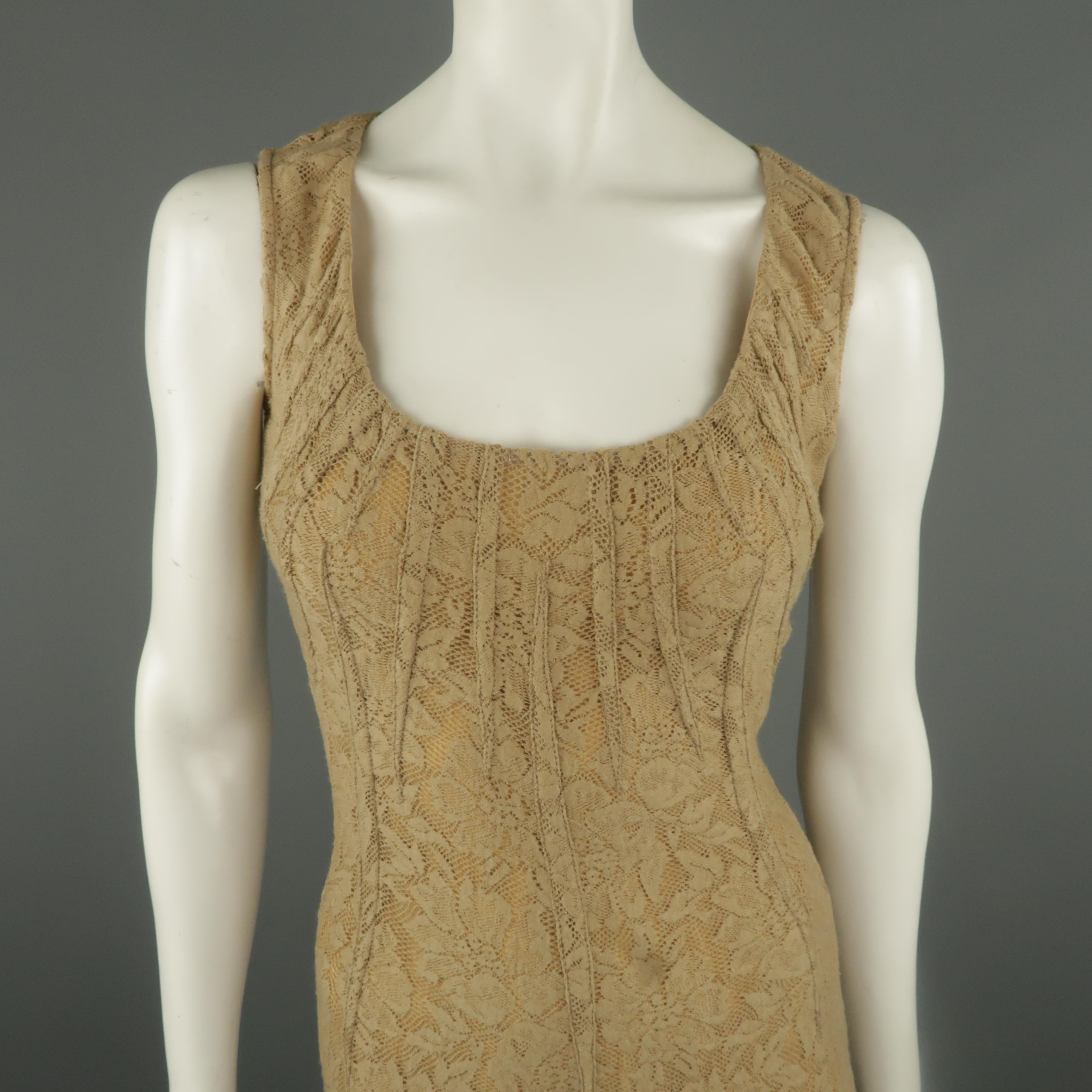 DOLCE & GABBANA cocktail midi dress comes in beige stretch wool lace with a scoop neck, darted accents, back zip, and fitted body. Made in Italy.
 
Good Pre-Owned Condition.
Marked: IT 40
 
Measurements:
 
Shoulder: 14 n.
Bust: 34 in.
Waist: 26
