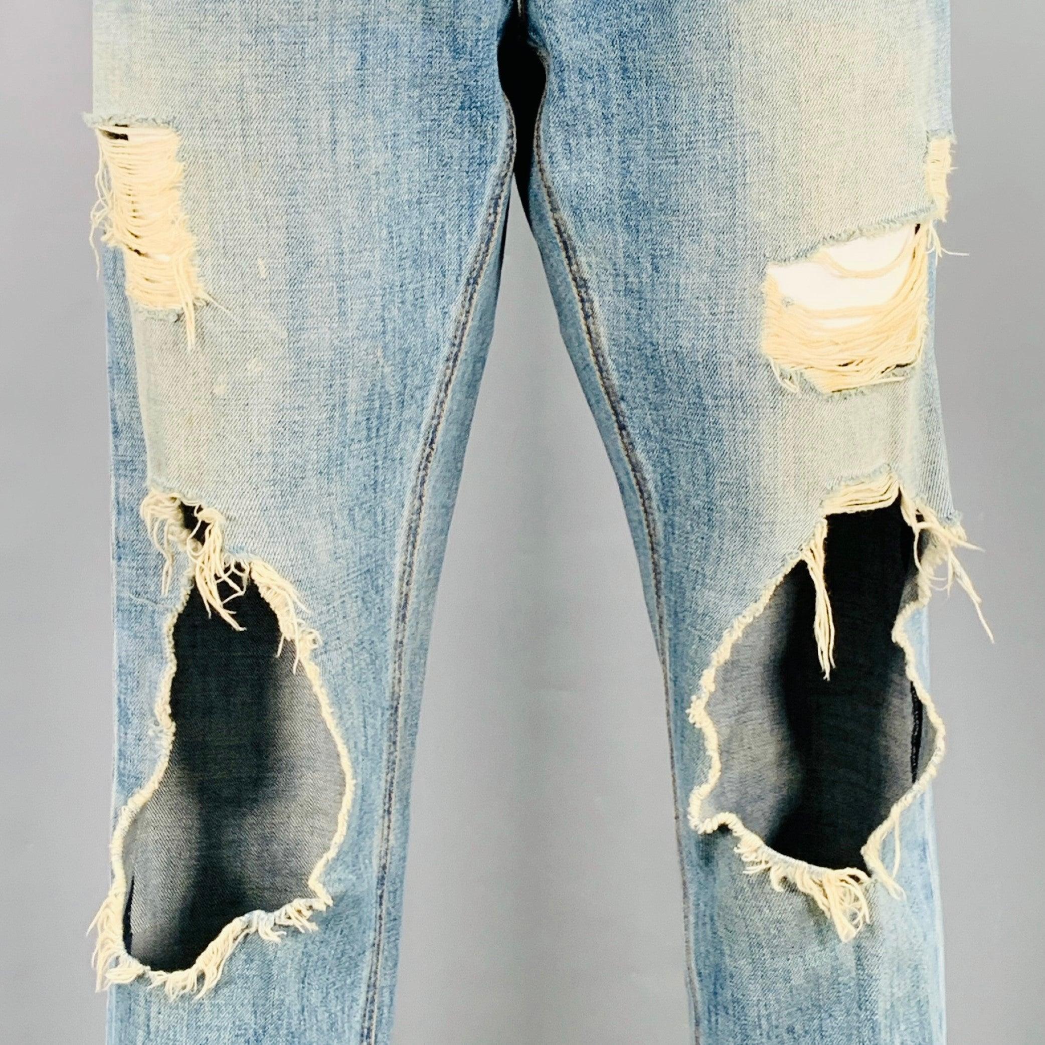 DOLCE & GABBANA boyfriend jeans
in a blue cotton denim twill featuring a distressed style, five pockets, and zip fly closure. Excellent Pre-Owned Condition. 

Marked:   IT 40 

Measurements: 
  Waist: 32 inches  Rise: 8 inches  Inseam: 28 inches 
 