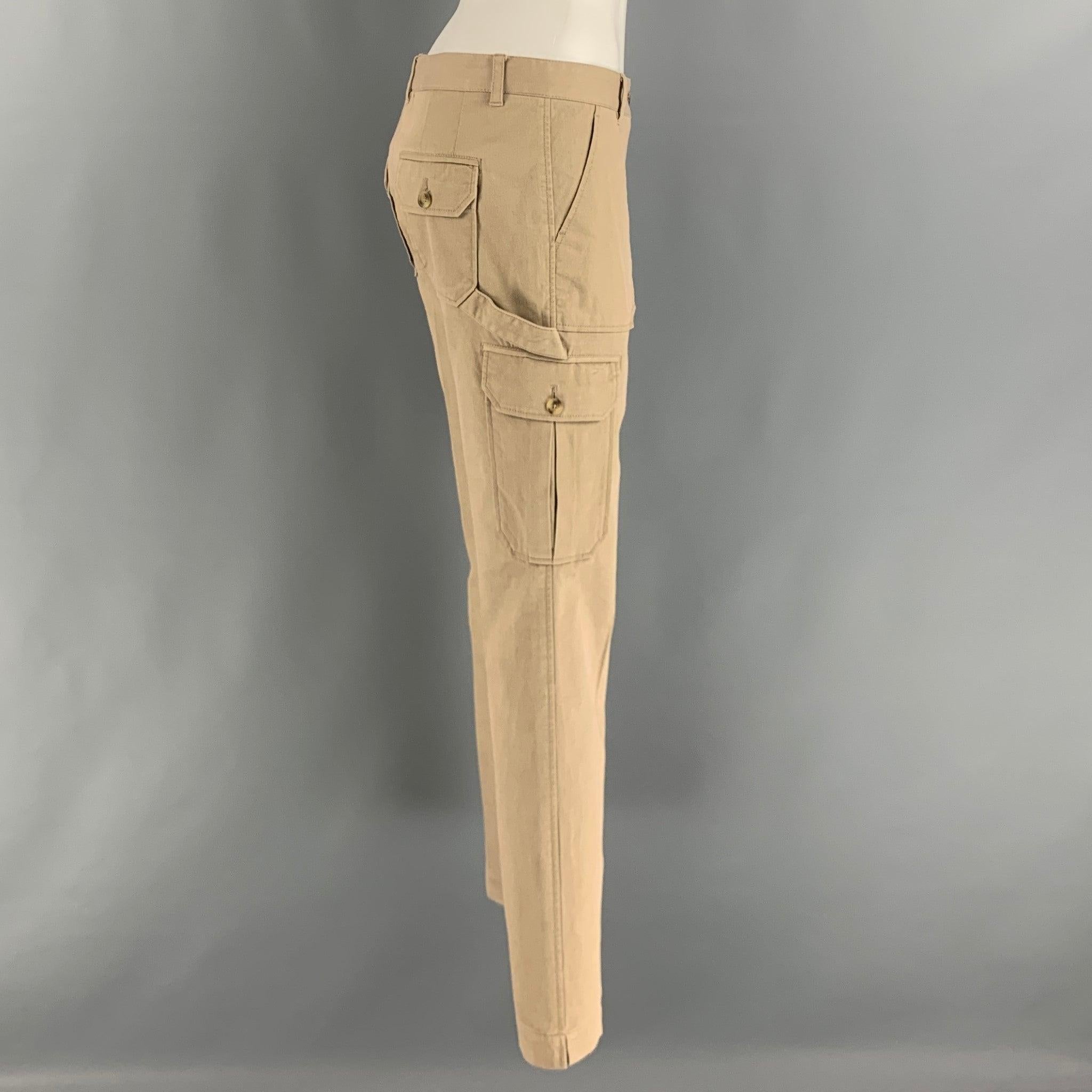 DOLCE & GABBANA pants comes in a khaki cotton and elastane twill material featuring a cargo style, low waist, and a side zipper closure. Made in
Italy.Excellent Pre-Owned Condition.
 

Marked:   40 

Measurements: 
  Waist: 31 inches Rise: 7.5