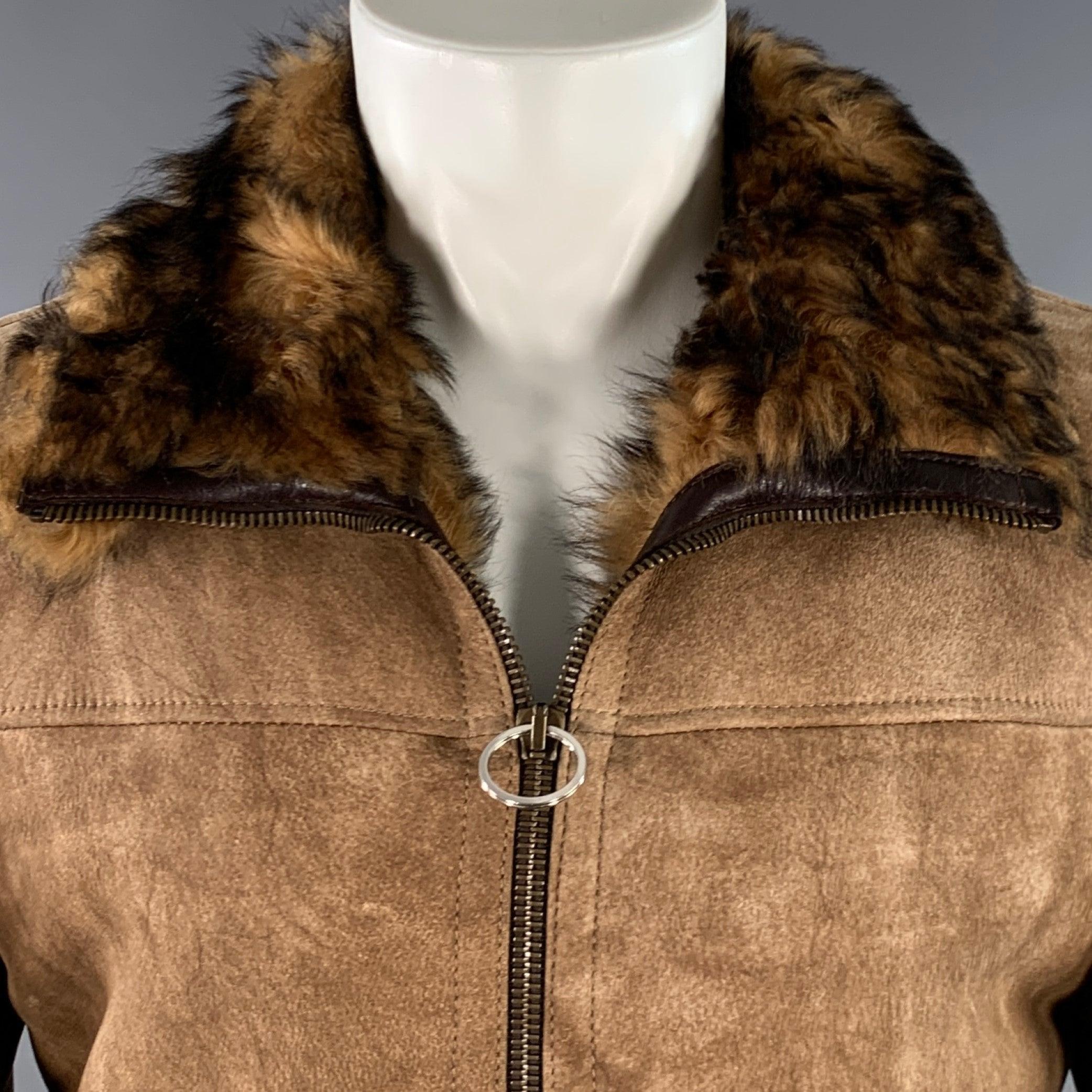 DOLCE & GABBANA jacket
in a brown deerskin leather featuring extra cozy sheep shearling lining, distressed design, and zip up closure. Made in Italy.Very Good Pre-Owned Condition. Minor mark on cuff. 

Marked:   IT 50 

Measurements: 
 
Shoulder: