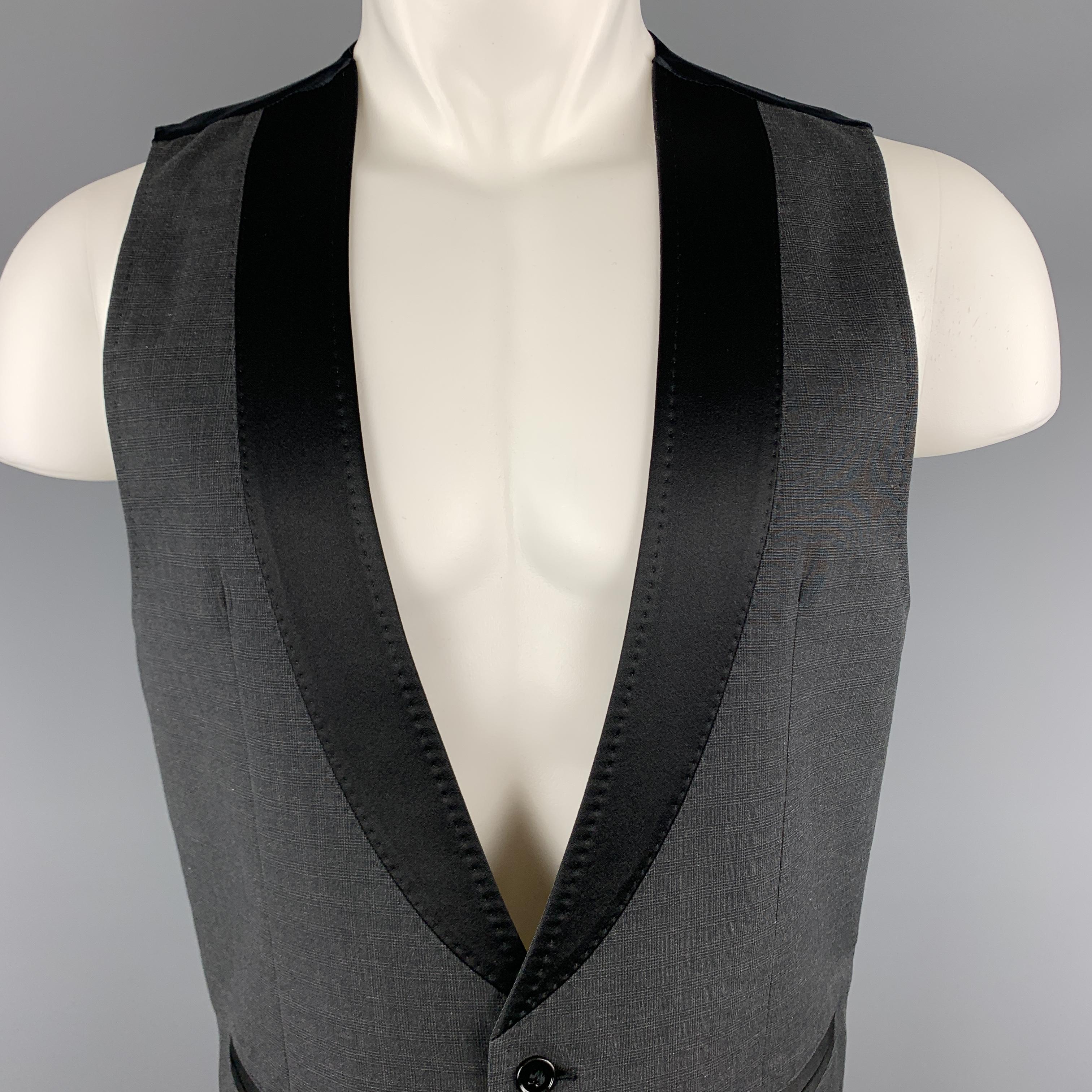 DOLCE & GABBAN tuxedo vest comes in charcoal plaid cotton with a silk blend mock shawl collar. Minor wear on back. As-is. Made in Italy.

Very Good Pre-Owned Condition.
Marked: IT 50

Measurements:

Shoulder: 13.5 in.
Chest: 39 in.
Length: 27 in.