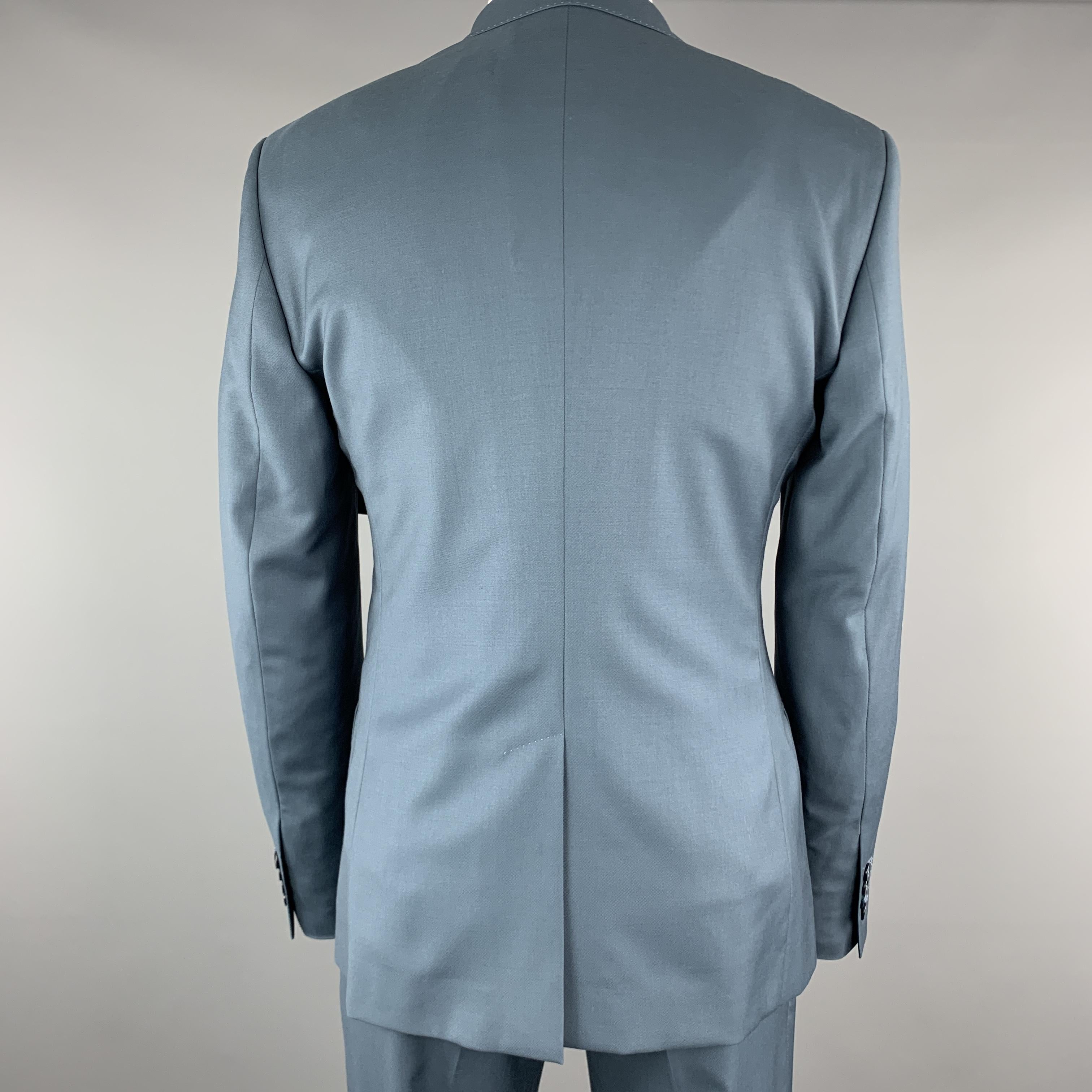 teal blue suit