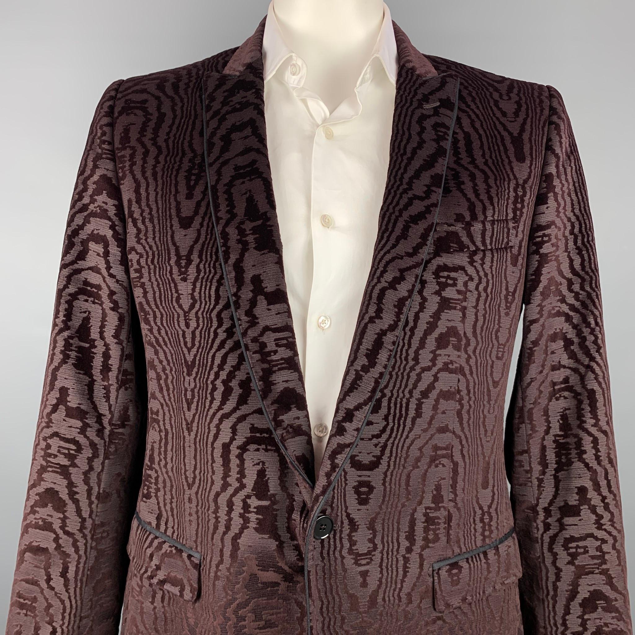 DOLCE & GABBANA sport coat comes in a burgundy jacquard cotton / silk with a full liner featuring a peak lapel, flap pockets, and a single button closure. Made in Italy.

Very Good Pre-Owned Condition.
Marked: IT 54

Measurements:

Shoulder: 18