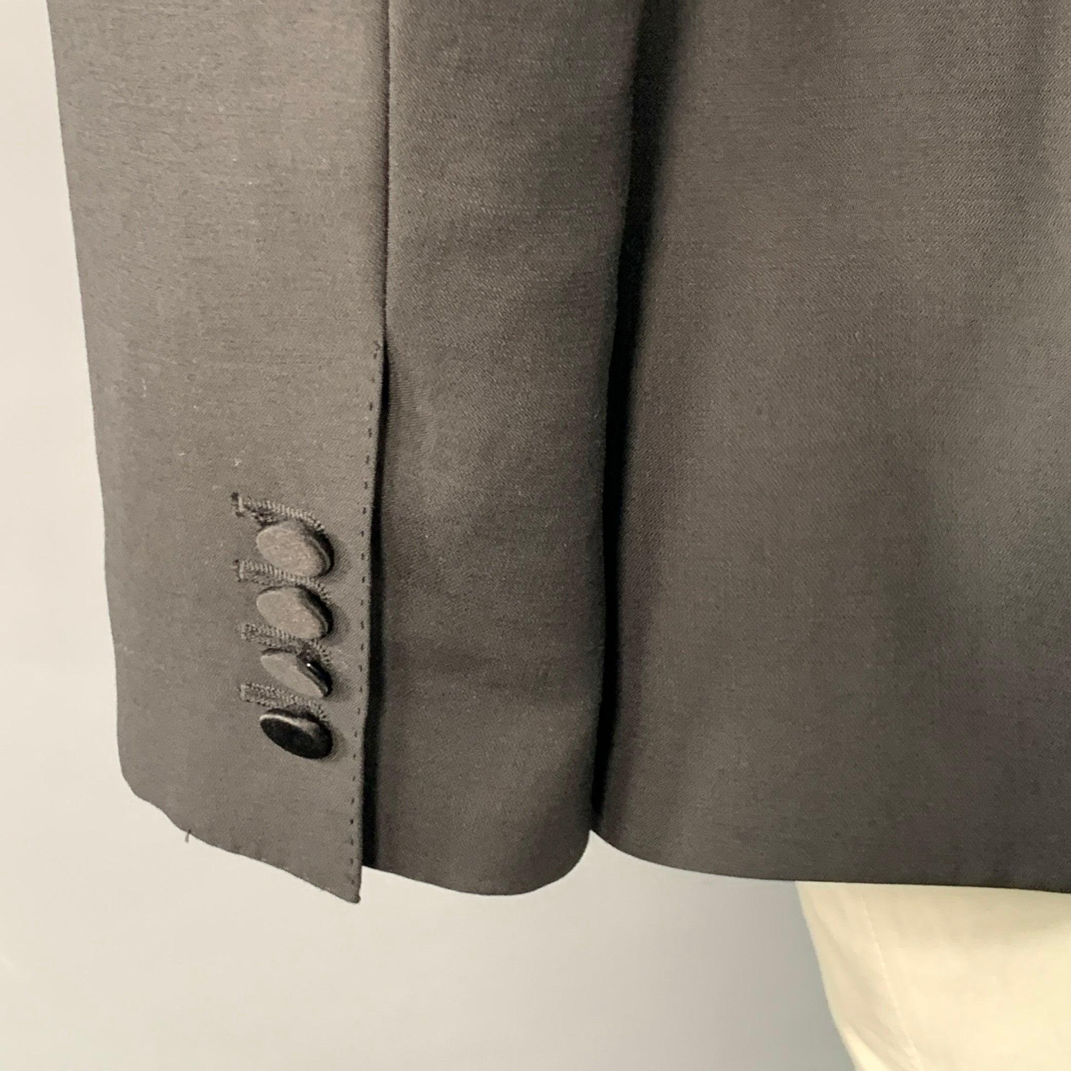 DOLCE & GABBANA Taglia 48 Smoking nero in lana vergine misto seta con risvolto a punta in vendita 1