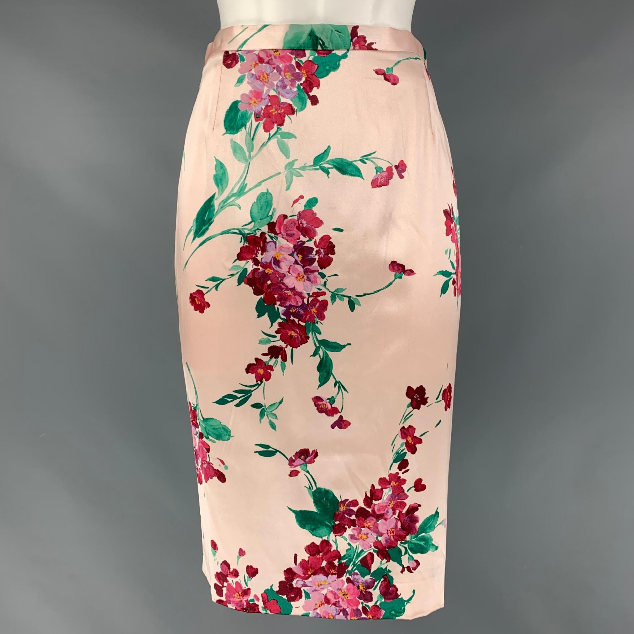 DOLCE & GABBANA pencil skirt comes in a blush and burgundy silk and spandex floral sateen featuring a button at back and a center back invisible closure.

Excellent Pre-Owned Condition.
Marked: 42

Measurements:

Waist: 27 in.
Hip: 34 in.
Length: 25