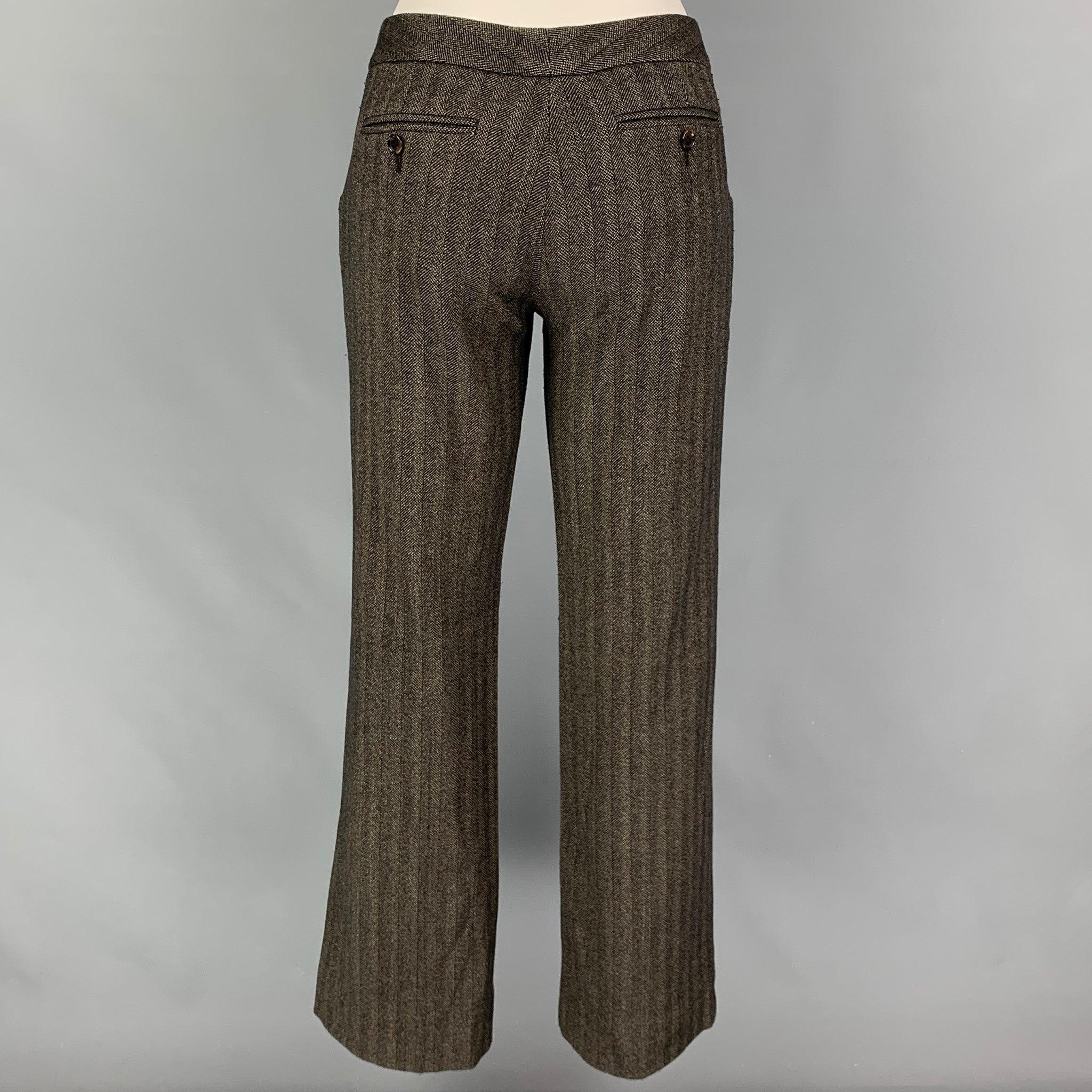 DOLCE & GABBANA pants comes in a brown & red herringbone wool blend featuring a low rise, flat front, and a zip fly closure. Made in Italy. Very Good
 Pre-Owned Condition. 
 

 Marked:  42 
 

 Measurements: 
  Waist: 32 inches Rise: 8.5 inches