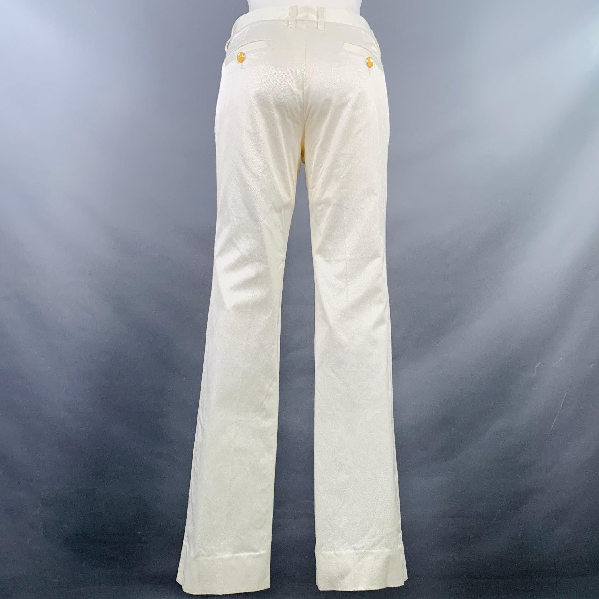 DOLCE & GABBANA casual pants
in a white cotton blend twill featuring a flat front, straight leg, and zip fly closure. Made in Italy.Good Pre-Owned Condition. Moderate pilling, as is. 

Marked:   IT 42 

Measurements: 
  Waist: 30 inches Rise: 6.5