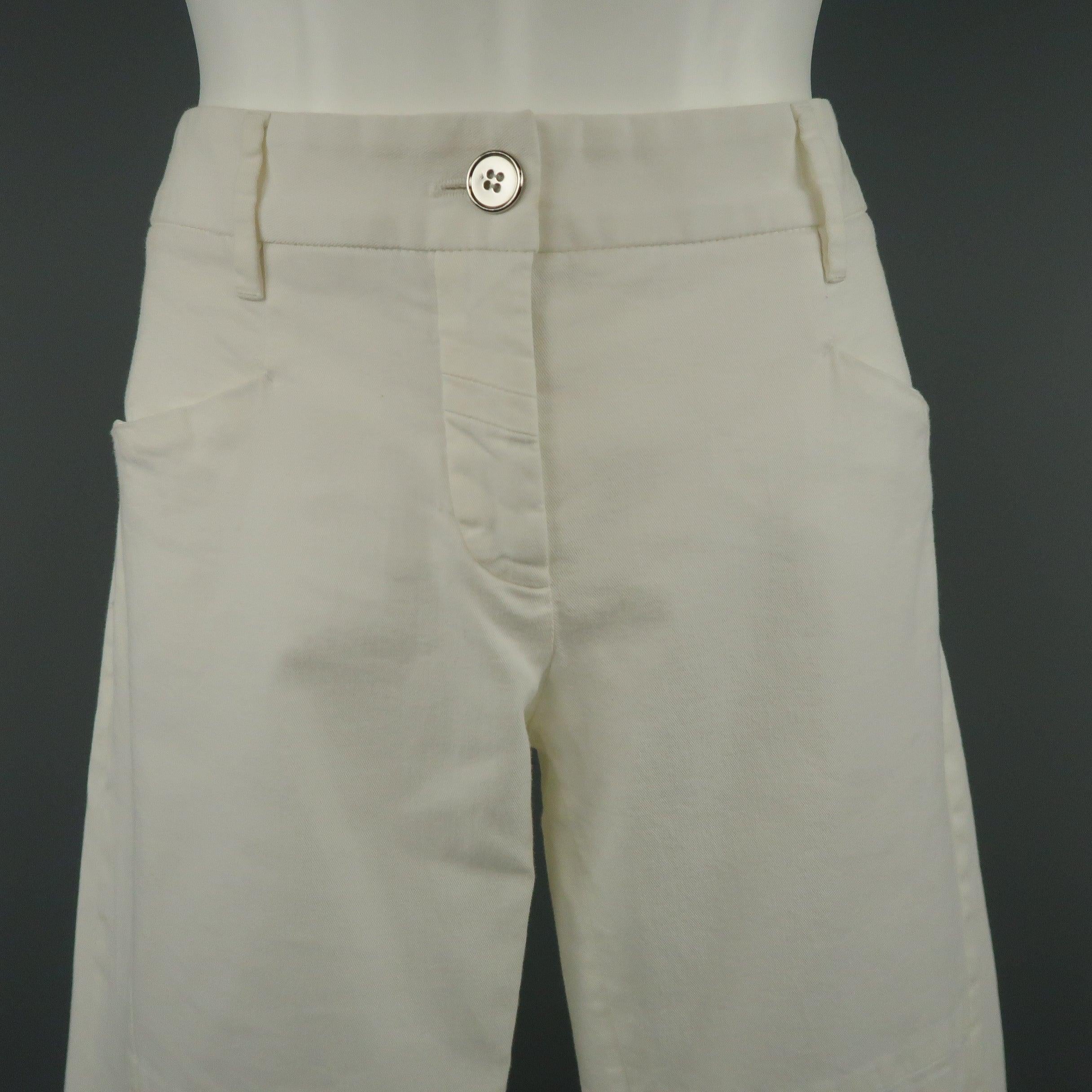 DOLCE & GABBANA skinny pants come in white stretch cotton twill with a metallic silver tone button and biker pant details. Minor wear. Made in Italy.Very Good Pre-Owned Condition. 

Marked:   IT 42 

Measurements: 
  Waist: 32 inches Rise: 8 inches