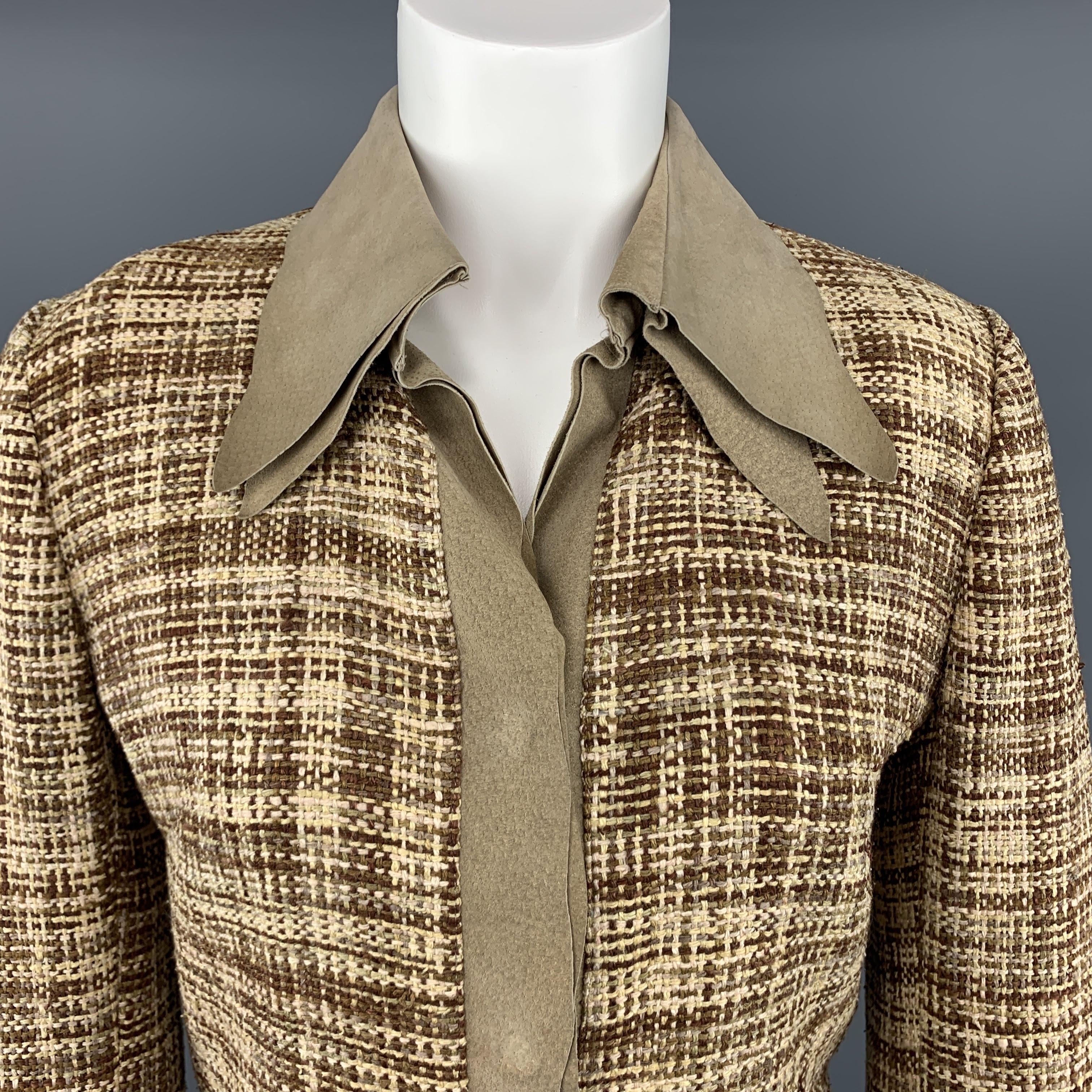 Vintage DOLCE  & GABBANA jacket comes in beige and brown woven silk tweed with hidden placket snap closures, thick beige nubuck leather trim, and double pointed collar. Made in Italy.
 
Excellent Pre- Owned Condition.
Marked: IT 44
 
Measurements:
