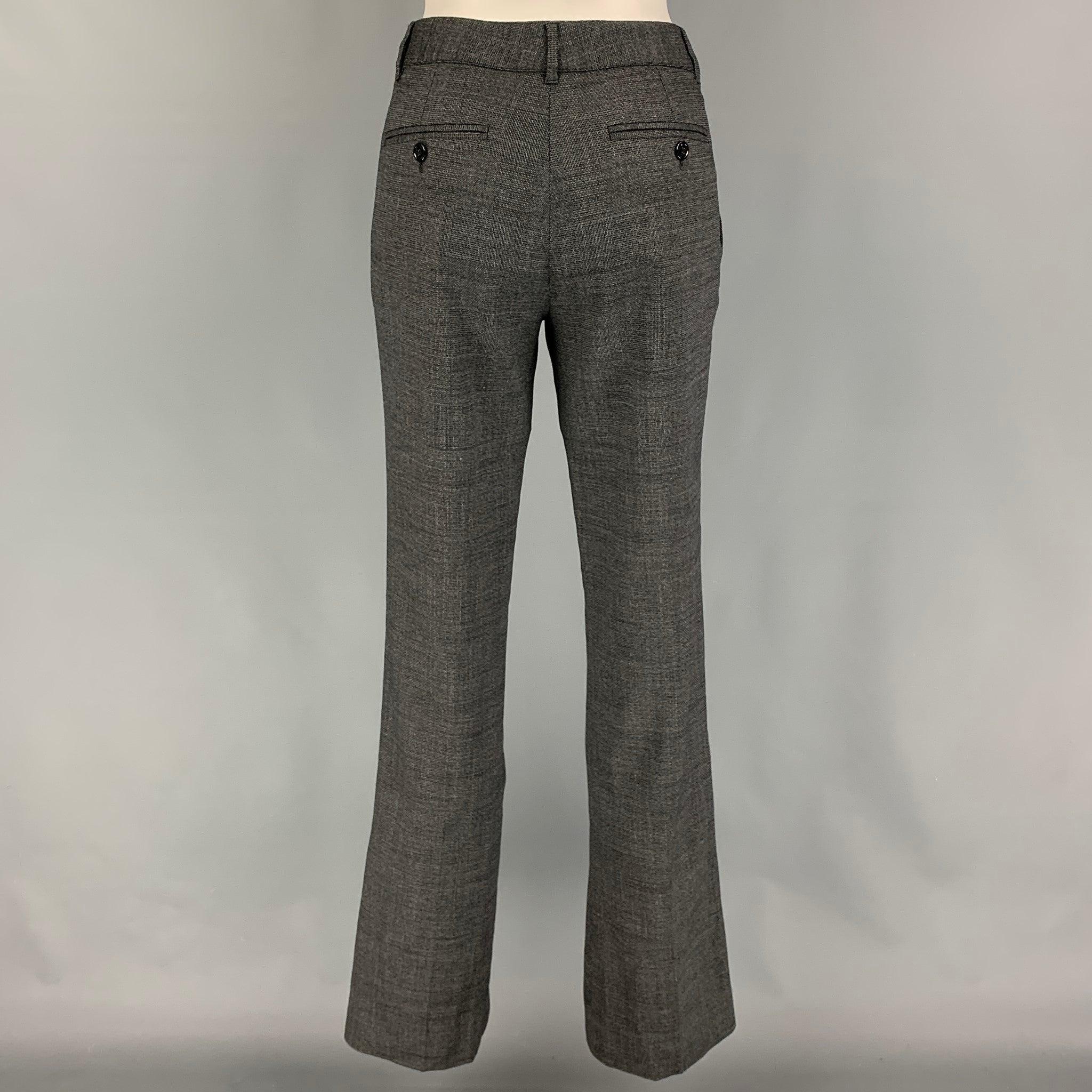 DOLCE & GABBANA dress pants comes in a black & grey virgin wool featuring a straight leg, pleated, and a zip fly closure. Made in Italy.
 Very Good
 Pre-Owned Condition. Small hole at leg. As-Is.  
 

 Marked:  44 
 

 Measurements: 
  Waist: 31