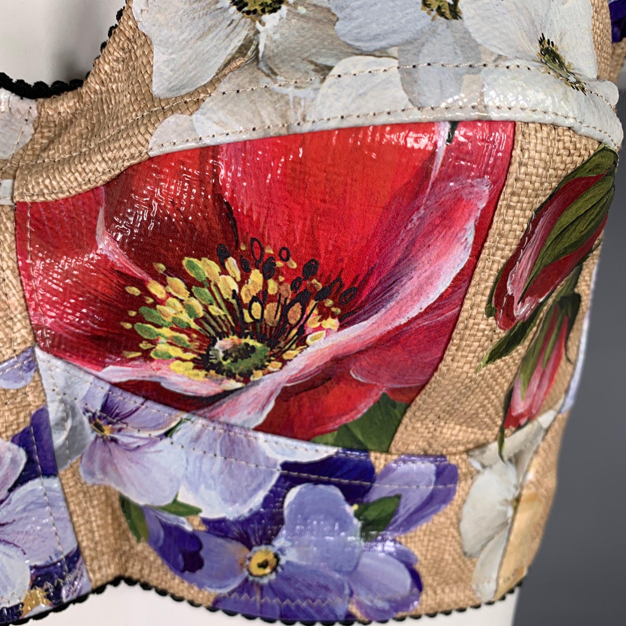 DOLCE & GABBANA casual top
in a multi-color nylon blend fabric featuring a bralette style, vibrant floral print, and back zipper closure. Made in Italy.Excellent Pre-Owned Condition. 

Marked:   IT 44 

Measurements: 
 
Shoulder: 15 inches Bust: 35