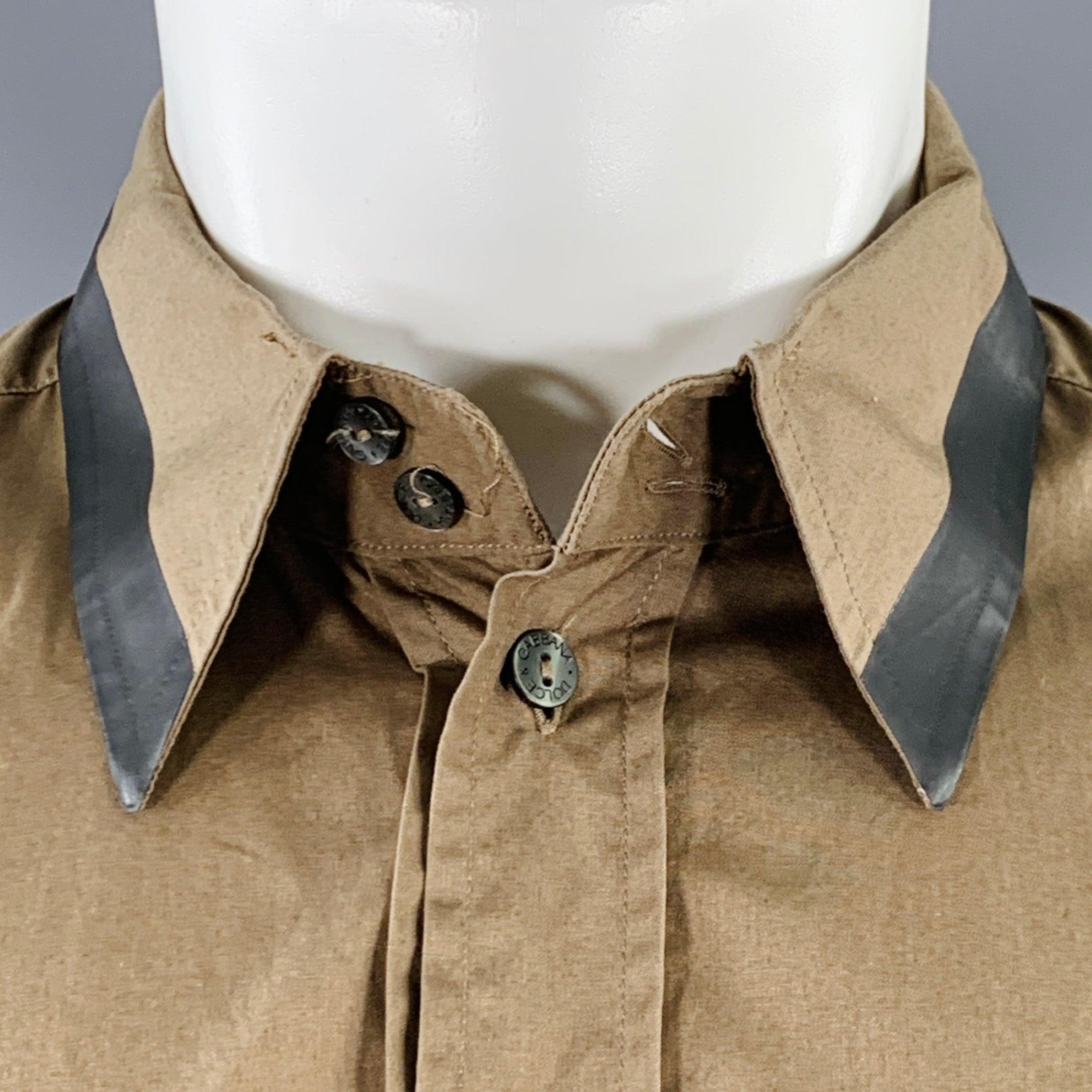 DOLCE & GABBANA long sleeve shirt in a tan cotton woven fabric featuring a black contrasting trim on collar and cuffs, and button closure. Made in Italy.Good Pre-Owned Condition. Moderate marks under arms, as is. 

Marked:   18/41 

Measurements: 
