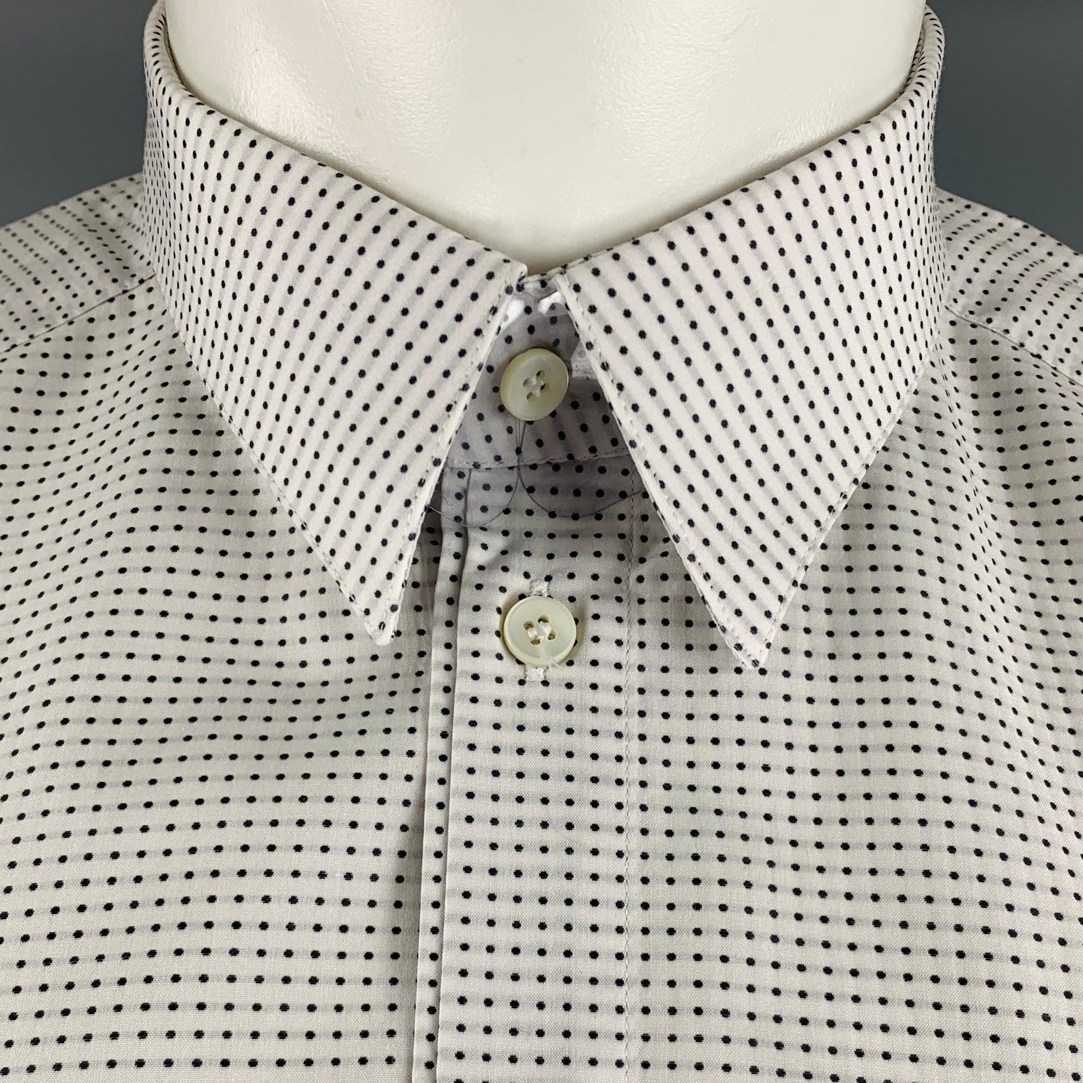 DOLCE & GABBANA long sleeve shirt in a white and grey cotton fabric featuring dots pattern, spread collar, and button closure. Made in Italy.Excellent Pre-Owned Condition. 

Marked:   16/41 

Measurements: 
 
Shoulder: 15.5 inches Chest: 40 inches