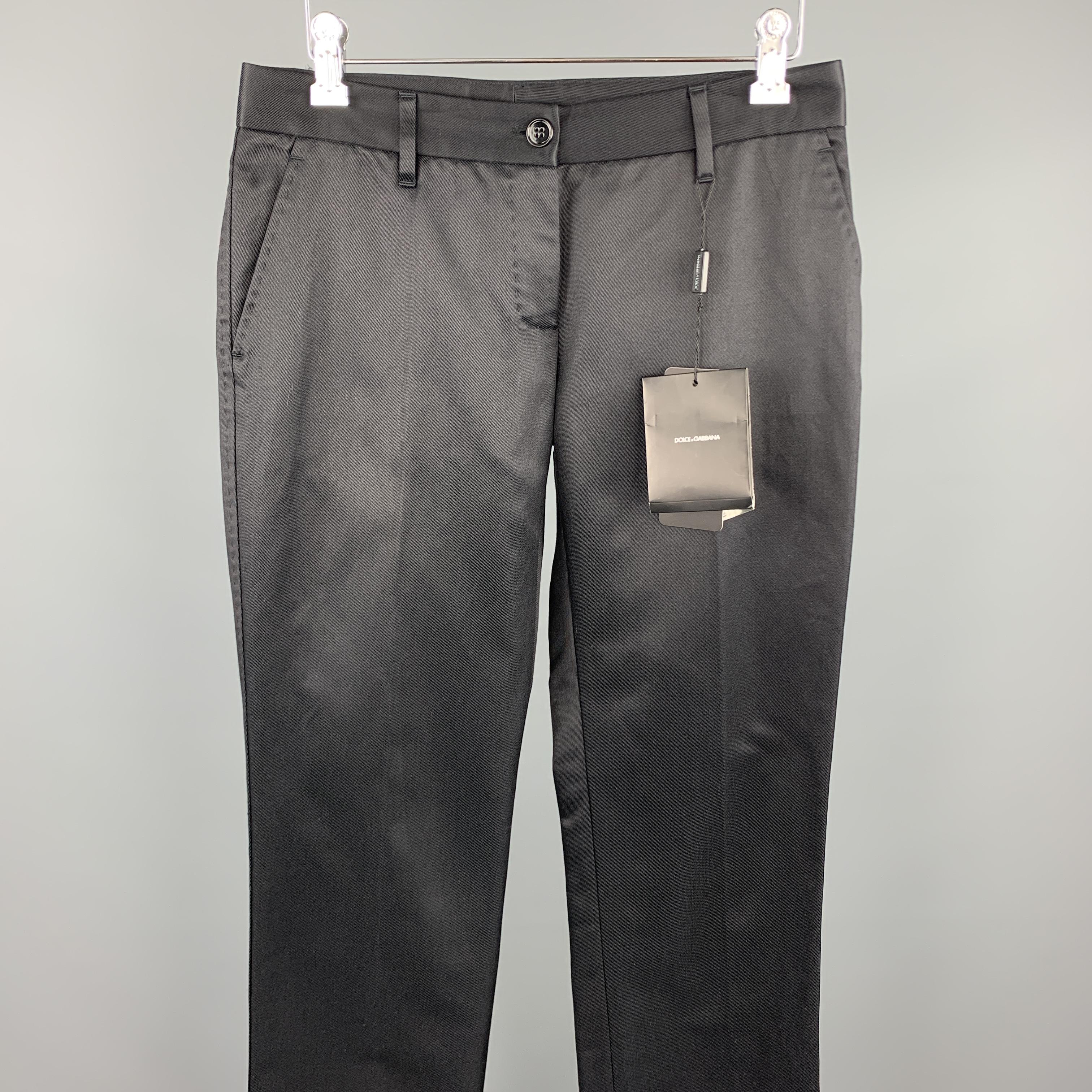 DOLCE & GABBANA dress pants black cotton / silk featuring a flat front and a zip fly closure. Made in Italy.

New With Tags.
Marked: IT 38

Measurements:

Waist: 29 in. 
Rise: 6.5 in. 
Inseam: 35 in. 