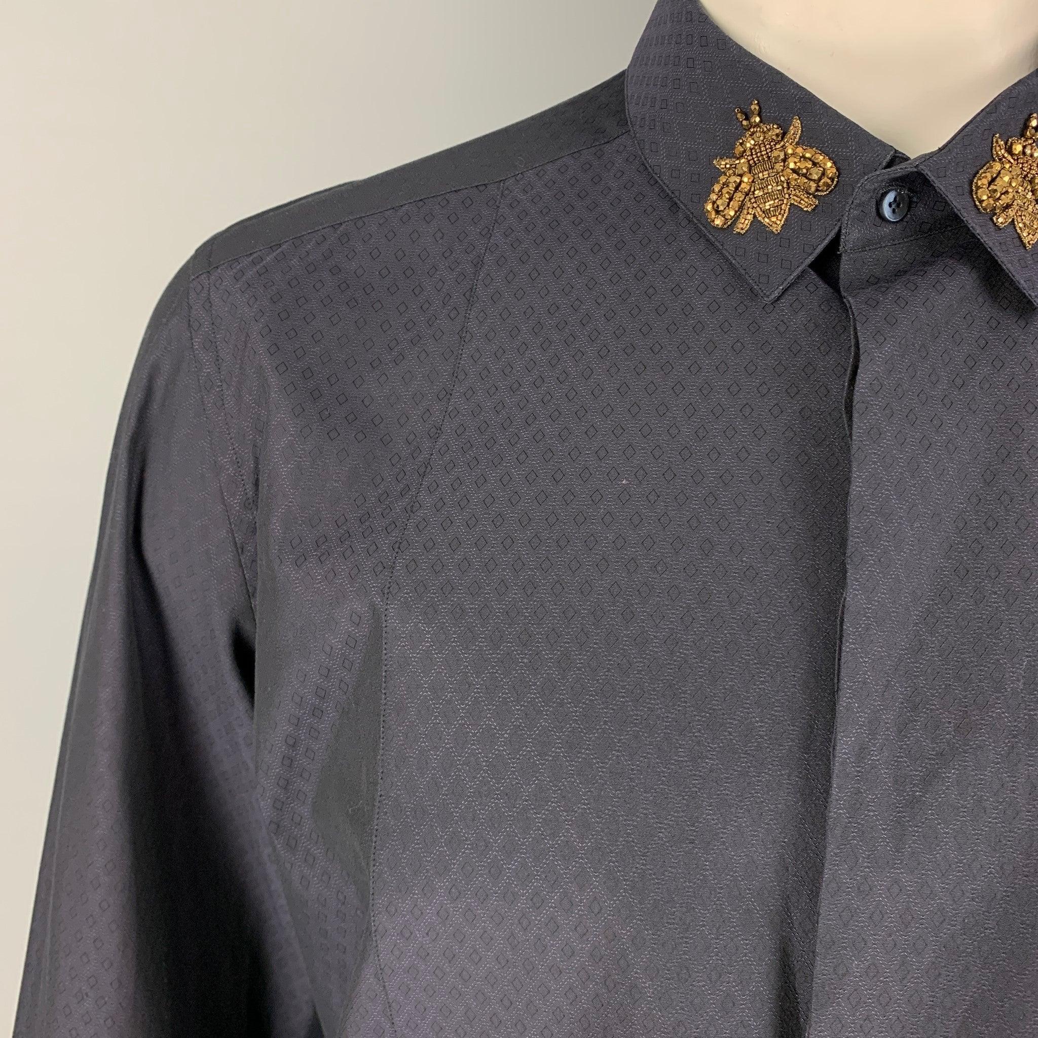 DOLCE & GABBANA long sleeve shirt comes in a navy rhombus print cotton featuring a beaded 