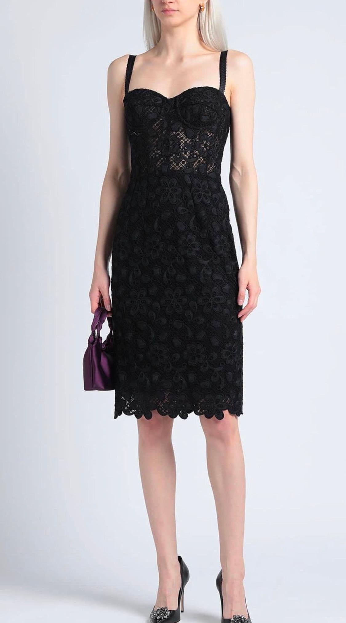 Black Dolce & Gabbana sleeveless sheath dress is
overlaid in delicate floral lace