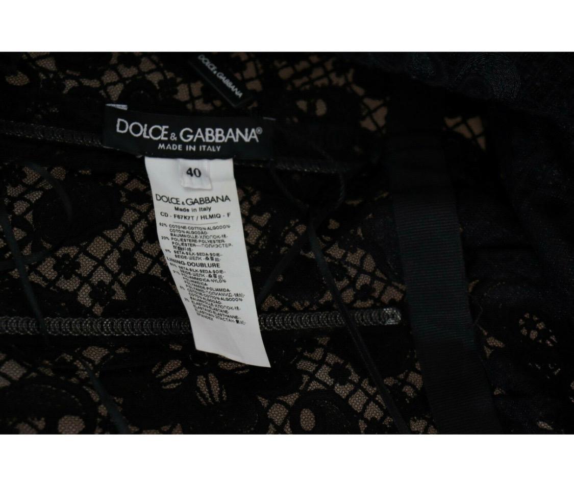 Dolce & Gabbana sleeveless sheath dress is
overlaid in delicate floral lace 4