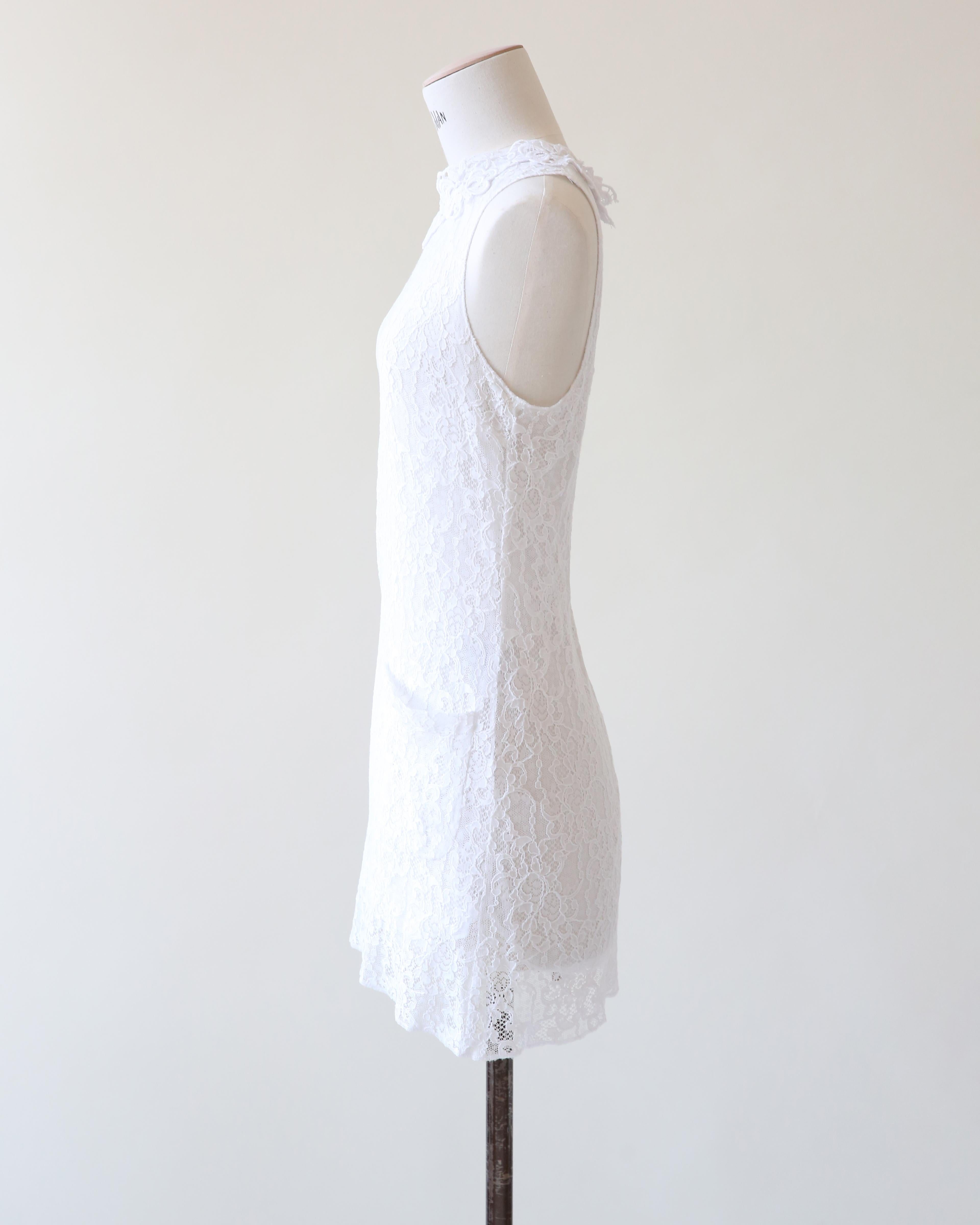 Dolce & Gabbana ärmelloses Minikleid aus weißer Spitze mit Taschen IT 42 im Angebot 5