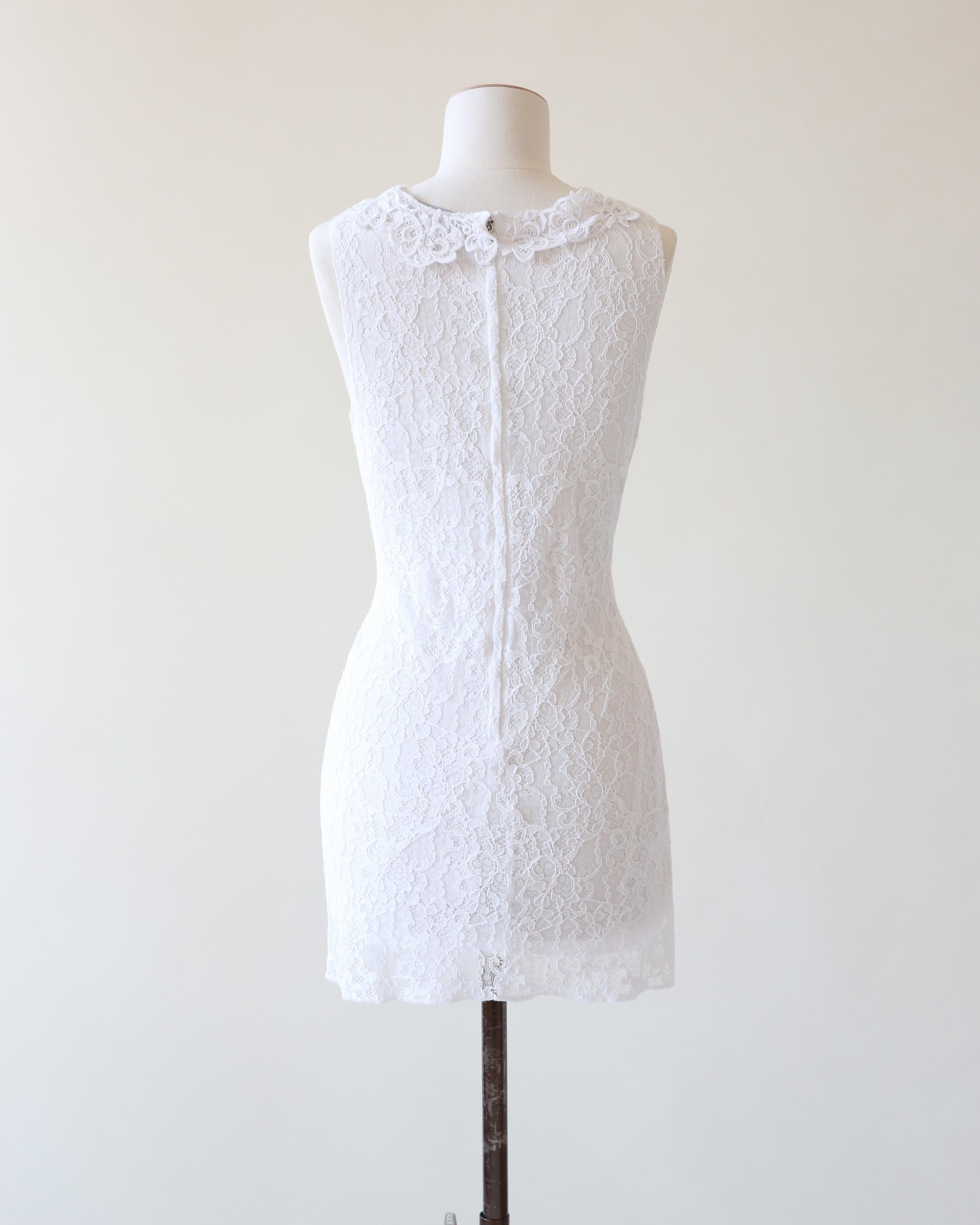 Dolce & Gabbana ärmelloses Minikleid aus weißer Spitze mit Taschen IT 42 im Angebot 6
