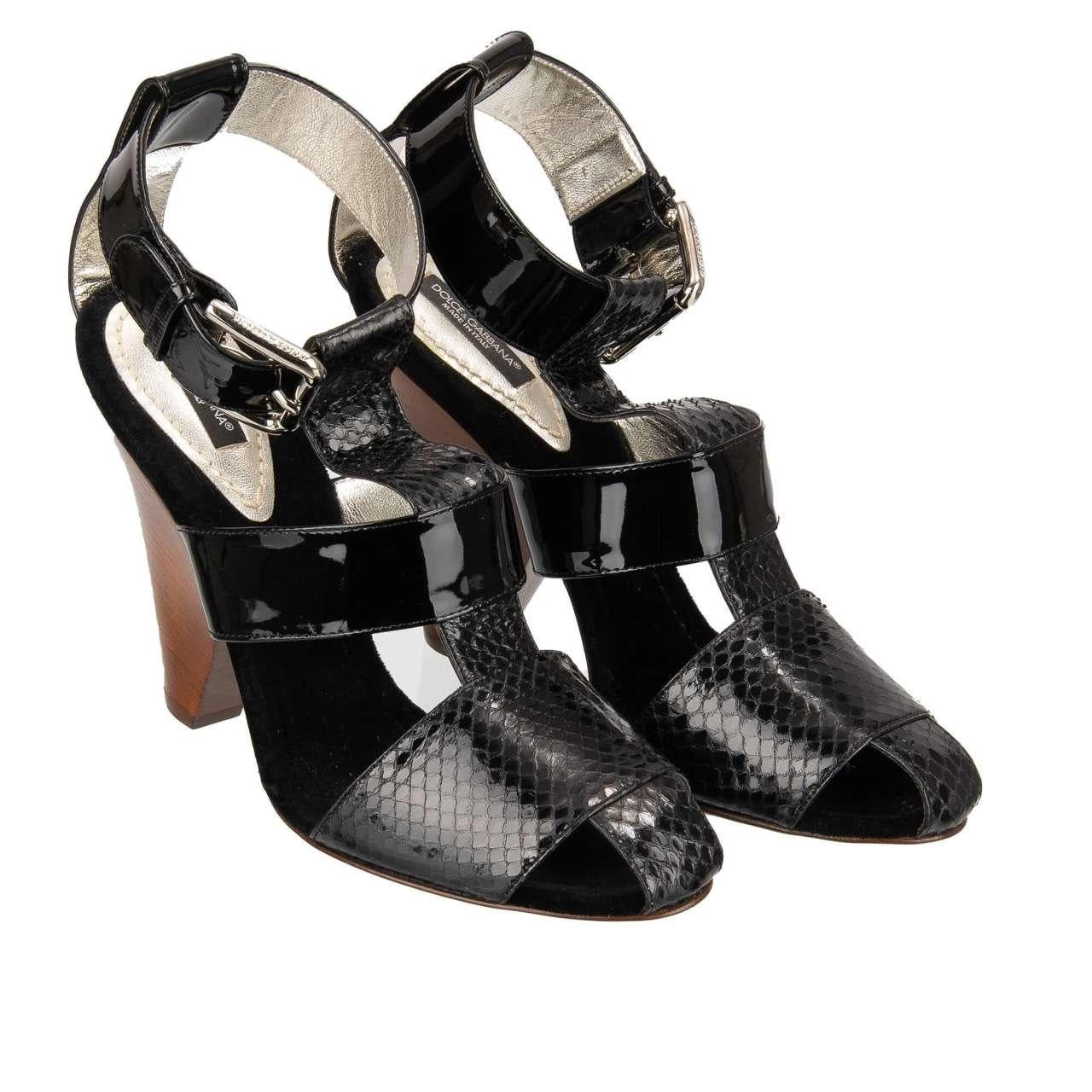 - Snake and patent leather Heels Sandals with straps in black by DOLCE & GABBANA - New with Box - MADE IN ITALY - Former RRP: EUR 595 - Model: C07630-A8765-8B956 - Material: 61% Ayers, 39% Calfskin - Inner Material: leather - Sole: Leather - Color: