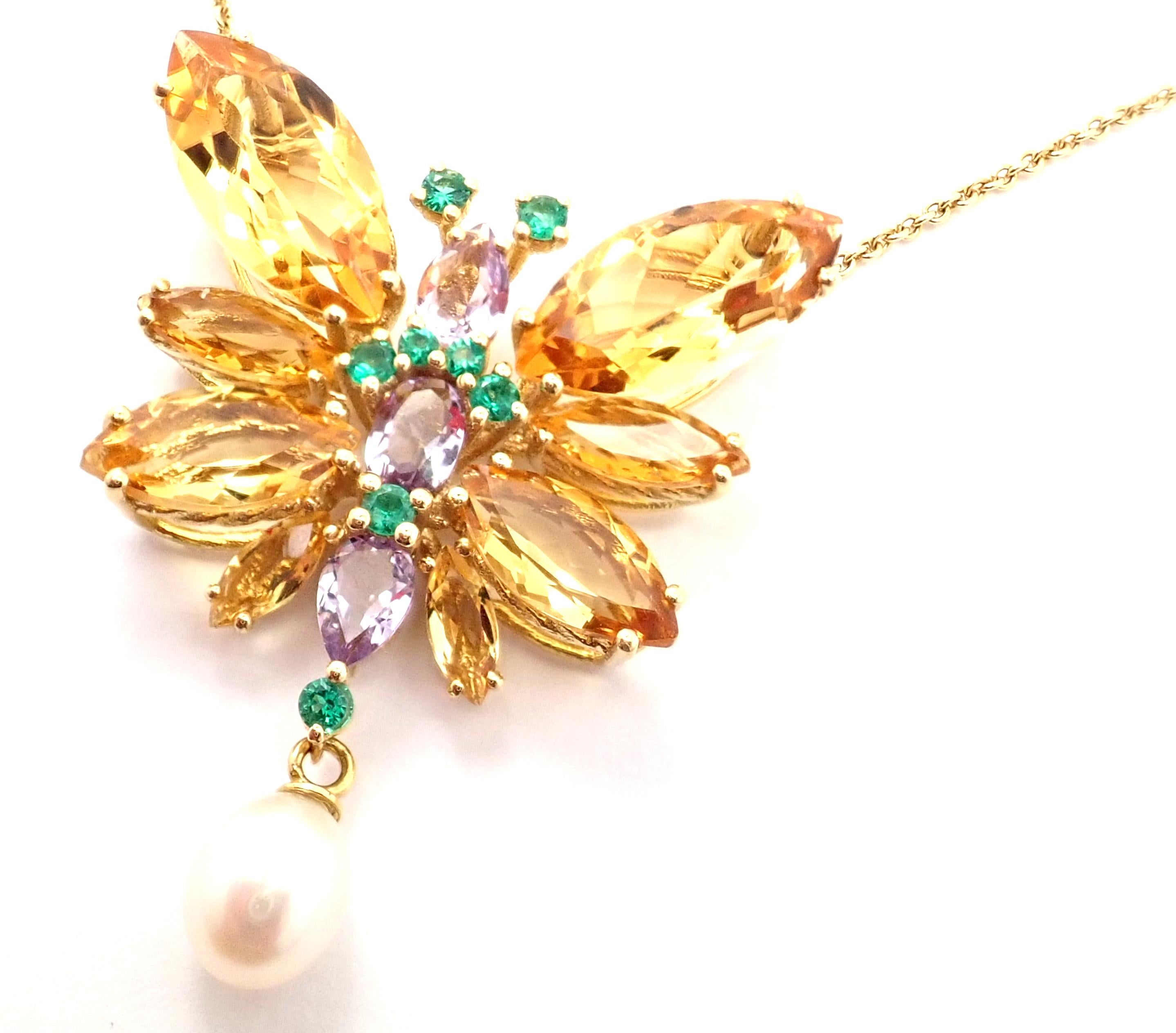 18k Yellow Gold Citrine Amethyst Emerald Butterfly Spring Pendant Necklace by Dolce & Gabbana. 
With 8 marquise citrines, quartz variety, 3 drop-shaped and oval amethysts, quartz variety, 8 round brilliant-cut emeralds, 2 freshwater drop