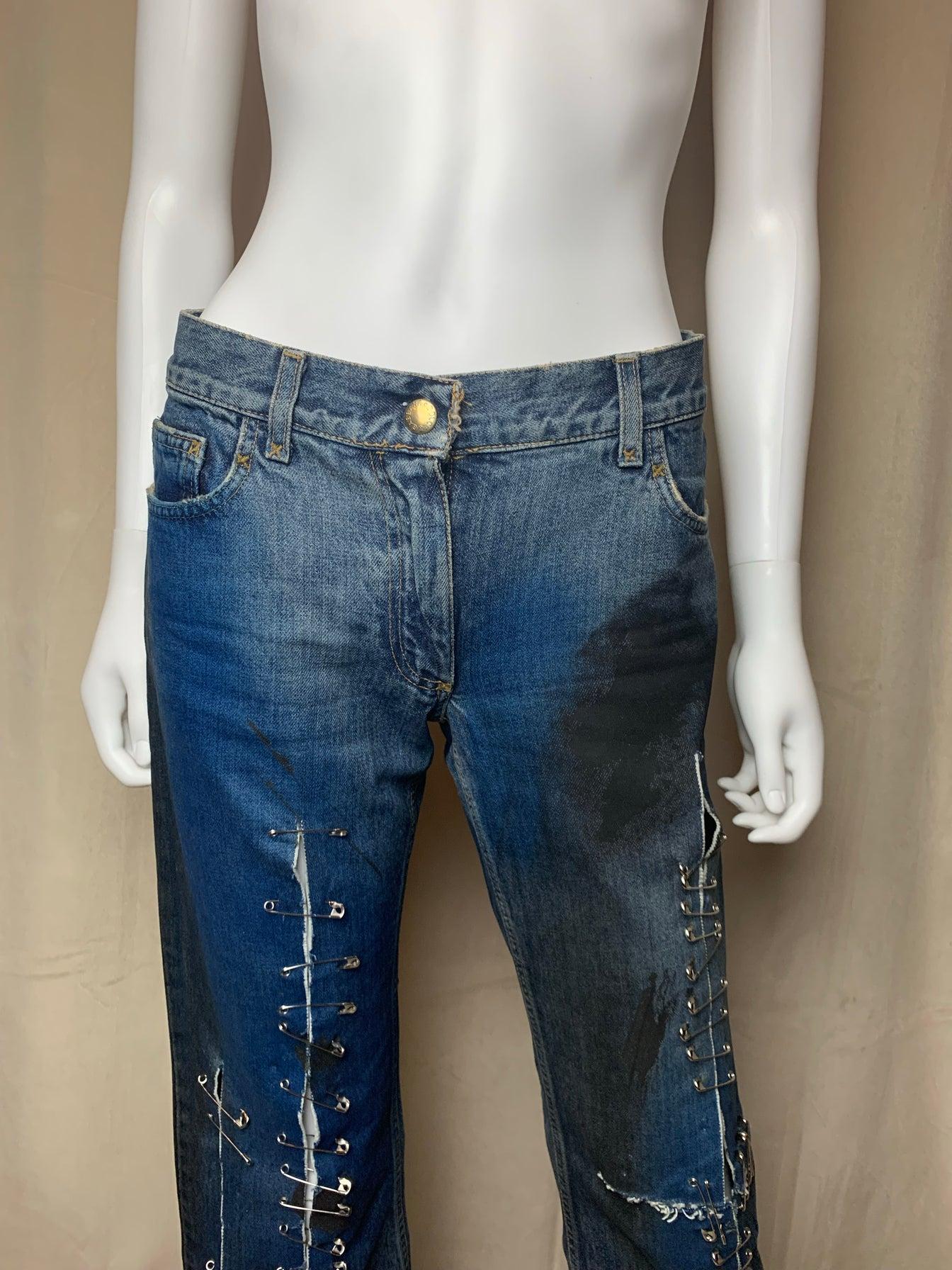 - Guaranteed 100% Authentic.

- Perfect preowned condition. The pants are destress and styled with safety pins. You can also add brooches and pins to the pants if you like. Also a big gold buckle on back of jeans. 

- Size: 2 US. waist: 14” inseam: