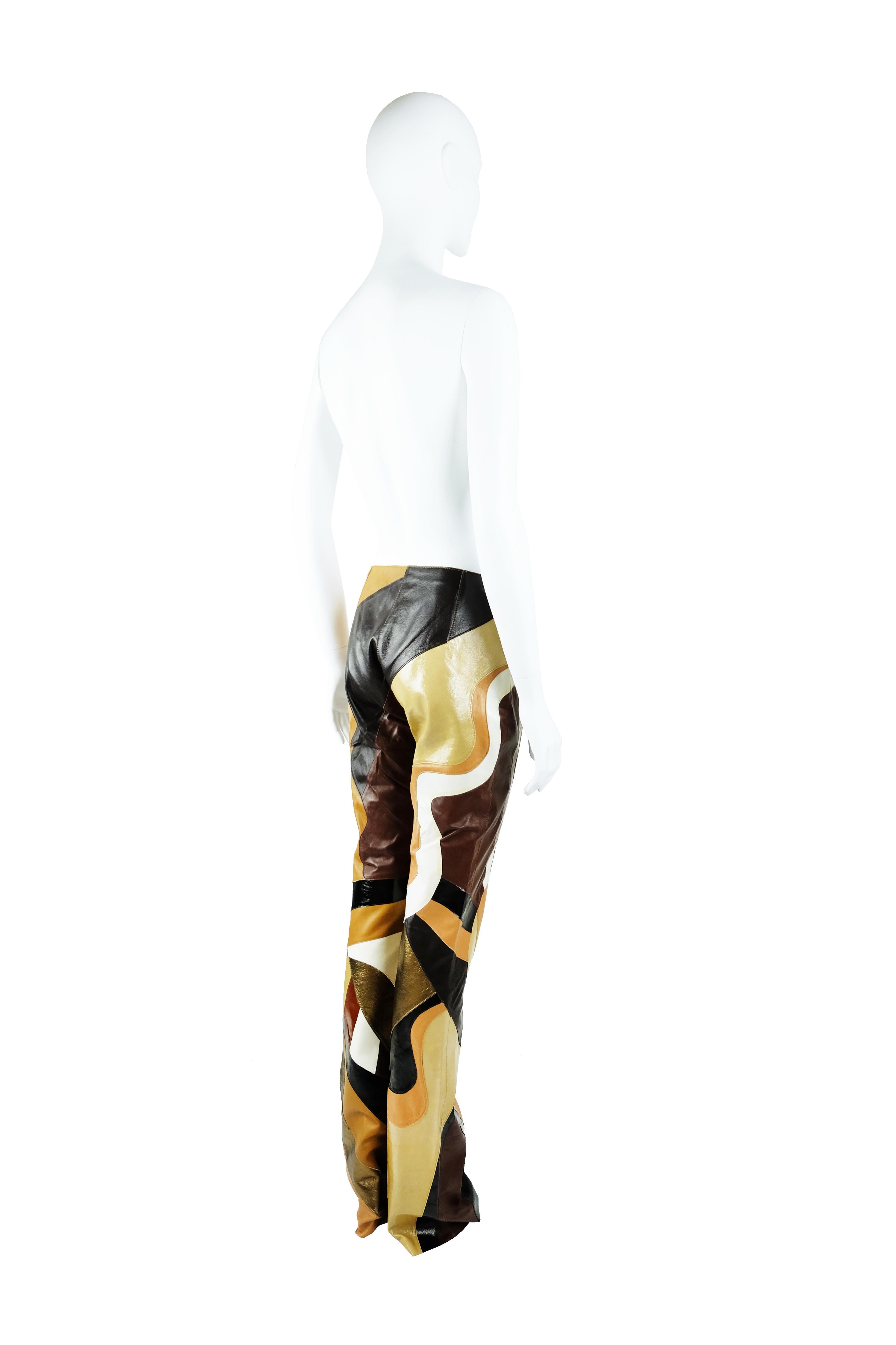 Dolce & Gabbana runway piece, exceptional craftsmanship brings this item closer to an artwork than a piece of clothing. 
Size IT40 usually corresponds to a size S but this item is tiny bit smaller, I would say XS.