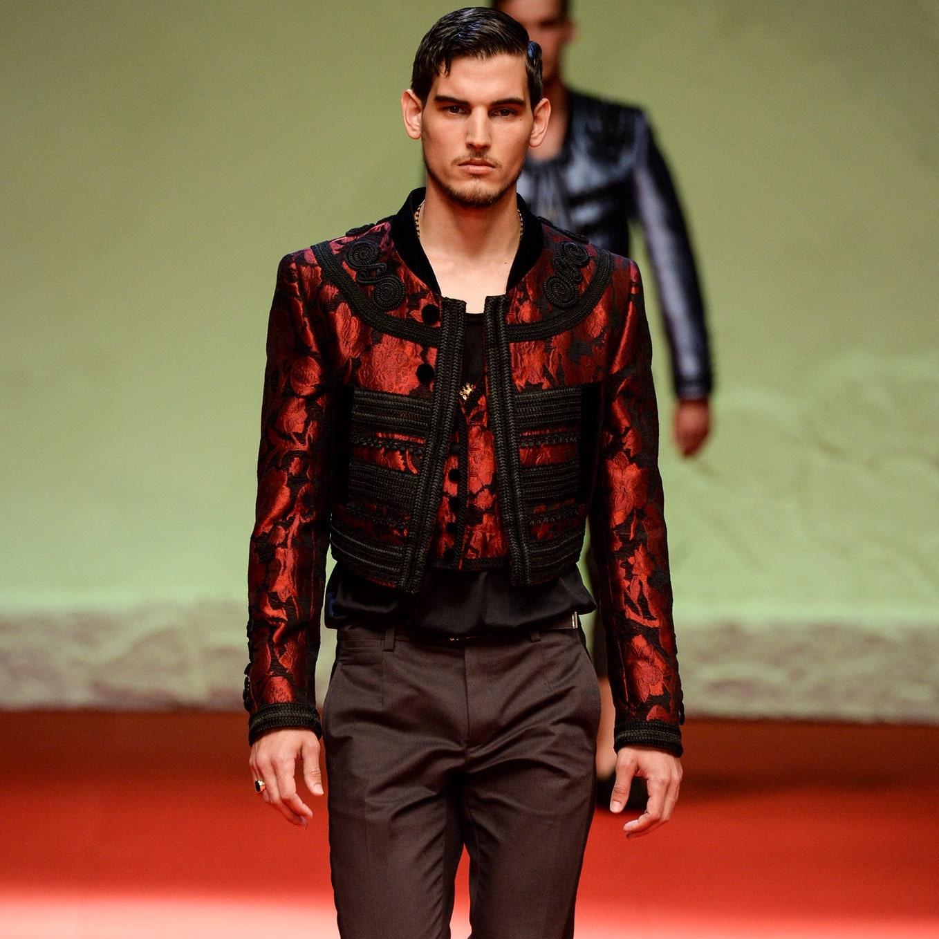 DOLCE & GABBANA SS 15
jacket set comes in a red & black brocade viscose blend with metallic jacquard details featuring a cropped style, velvet trim, open front, and a matching vest. Made in Italy. *Pants for photography only, not included. New With