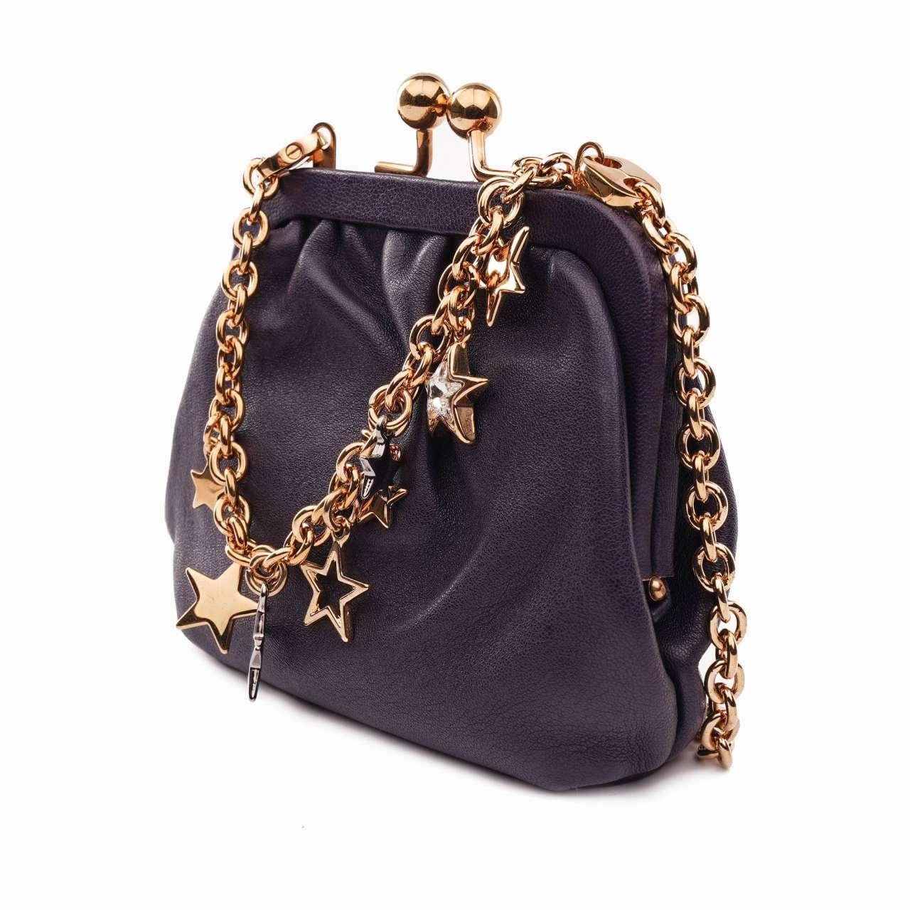 - Lambskin purse bag with metal stars crystal chain strap in purple and gold by DOLCE & GABBANA - New with Tag, Dustbag, Authenticity Card - Material: 100% Lambskin - Lining: Fabric - Interior: leather logo plate - Chain strap not removable (appr.