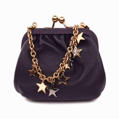 Dolce & Gabbana - Star Metallkette Clutch Geldbörse Tasche in Gold und Lila