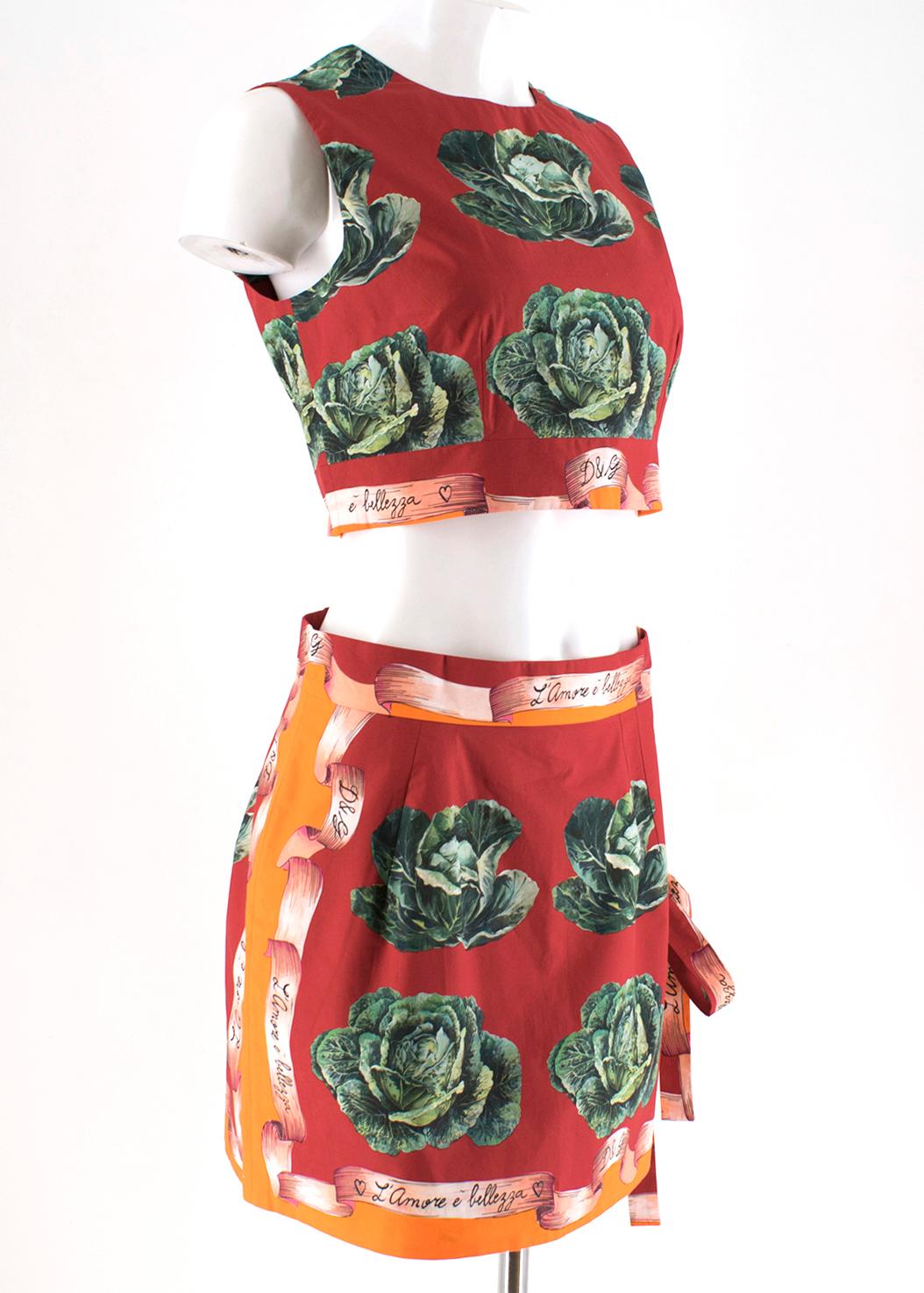 Dolce & Gabbana St.Cabbage Skirt & Top

Red skirt with cabbage design and orange detailing 
Above the knee 
High waist
Short length, 
Side bow fastenings.
Round neck
Sleeveless design
Back zip fastening
Cropped length 
Cabbage print 
Logo banner