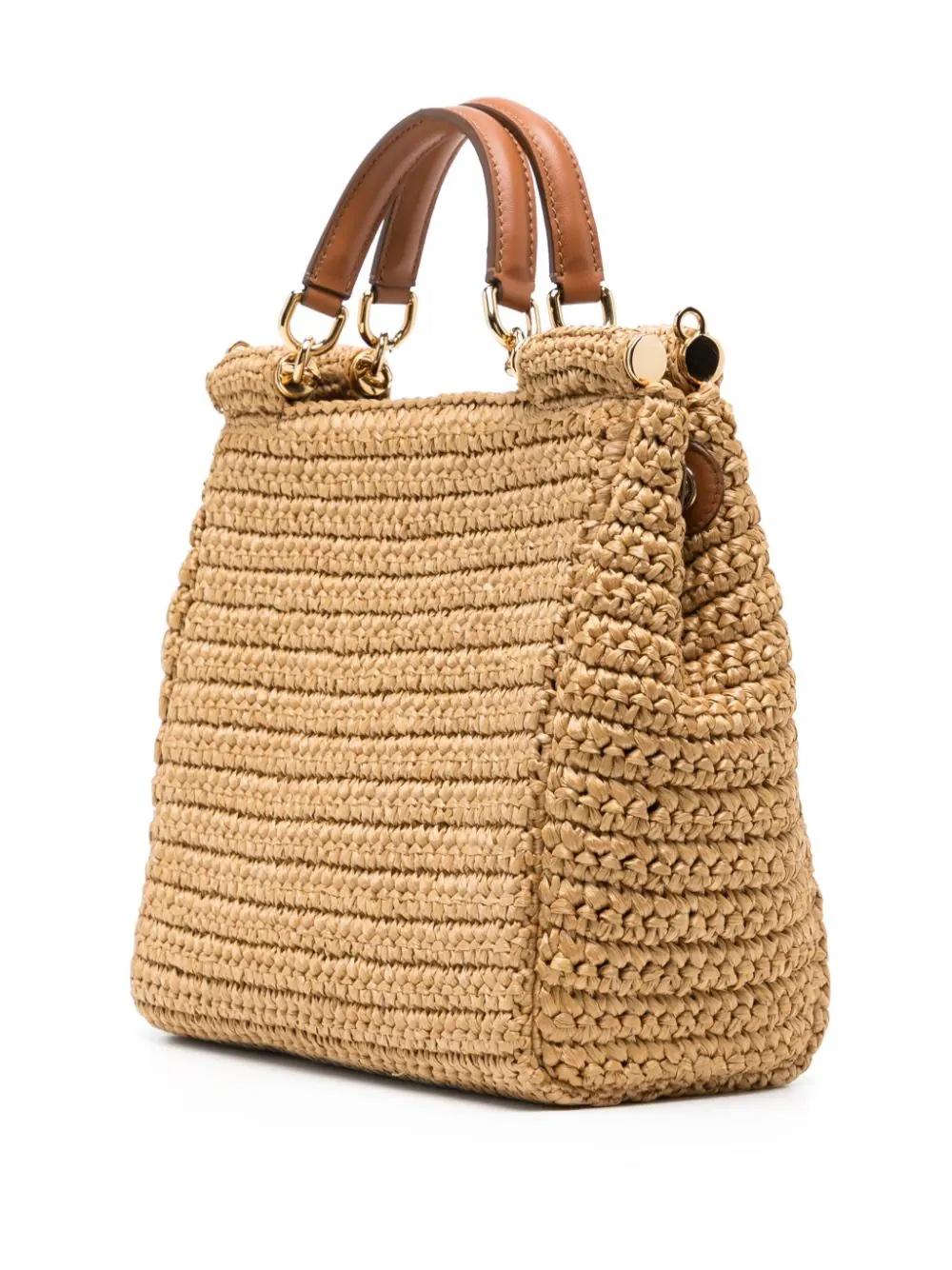 * Light brown
* Woven wicker design
* Leather trim
* Gold-tone logo plaque
* Two rolled top handles
* Magnetic fastening
* Main compartment
* Internal zip-fastening pocket
* Detachable shoulder strap
* Excellent Condition: This pre-owned item is in