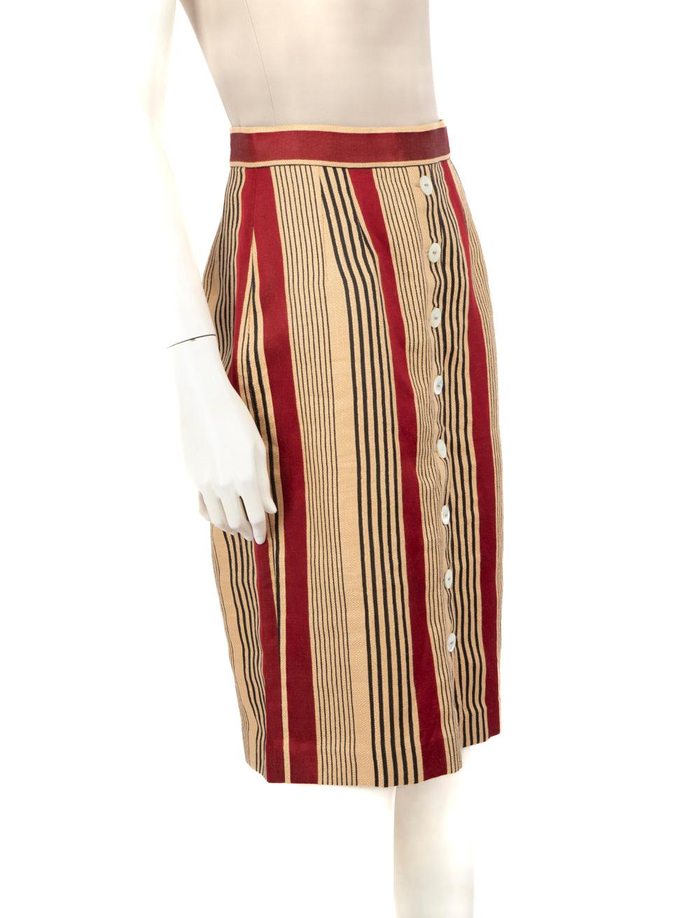 CONDITION is Very Good. Hardly any visible wear to the skirt is evident on this used Dolce & Gabbana designer resale item.



Details


Multicolour- beige, red, black

Linen

Skirt

A-line

Striped pattern

Midi

Front buttoned detail

Back zip and