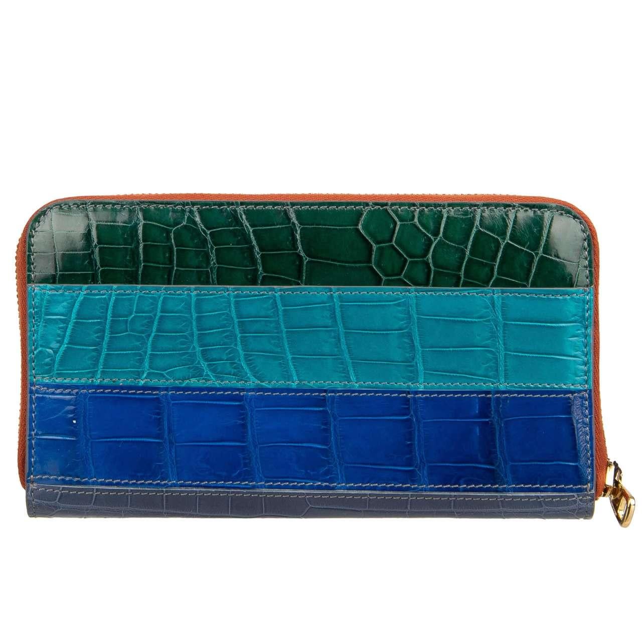 - Striped Crocodile Leather Patchwork Zip-Around wallet with logo plate in green and blue by DOLCE & GABBANA - New with Tag - MADE IN ITALY - Former RRP: EUR 2,350 - Model: BI0473-B251R-S9000 - Material: 100% Crocodile Leather (Coccodrillo) - Metal