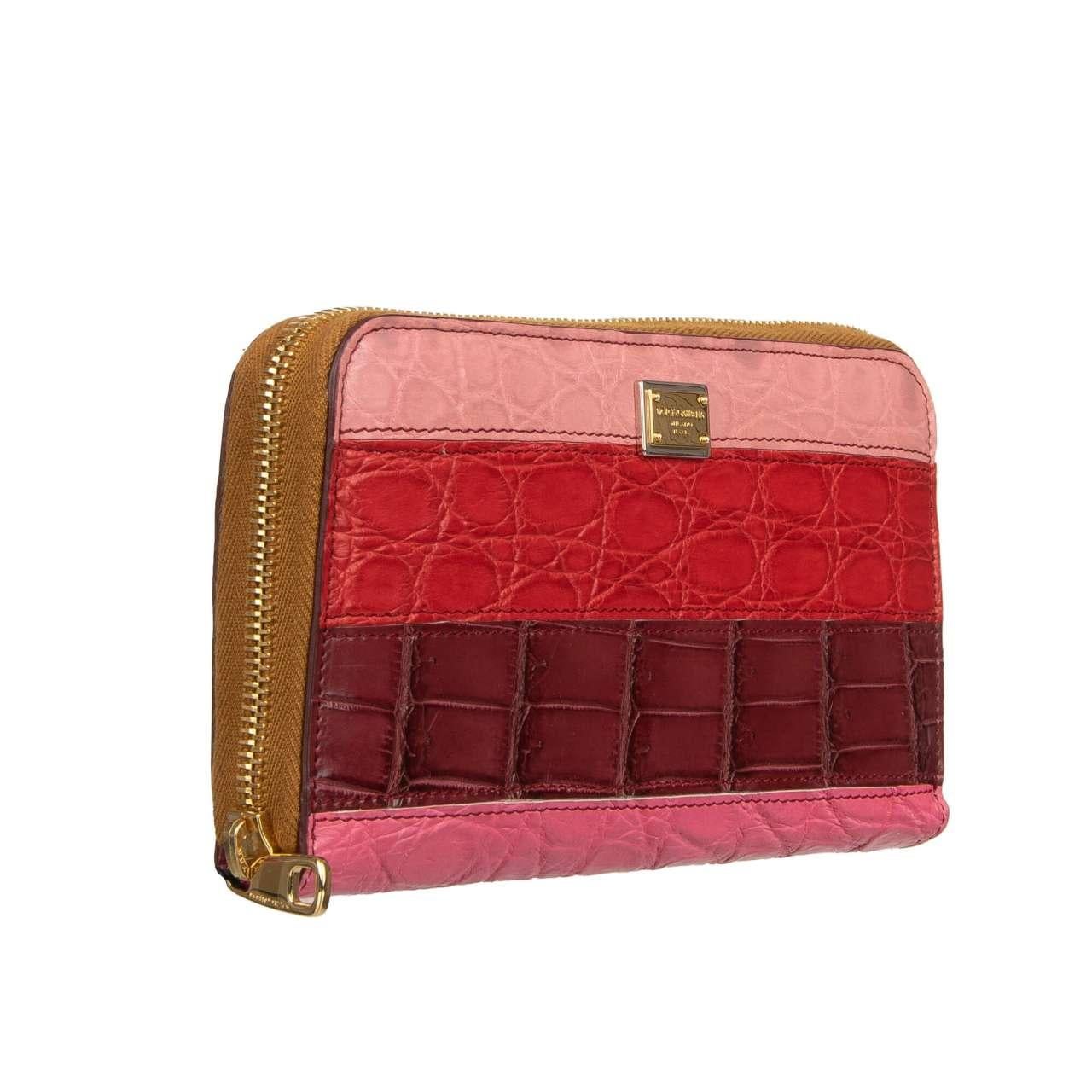 - Striped Crocodile Leather Patchwork Zip-Around wallet with logo plate in red and pink by DOLCE & GABBANA - New with Tag - MADE IN ITALY - Former RRP: EUR 2,350 - Model: BI0473-B297P-S9000 - Material: 80% Crocodile Leather (Coccodrillo), 20%