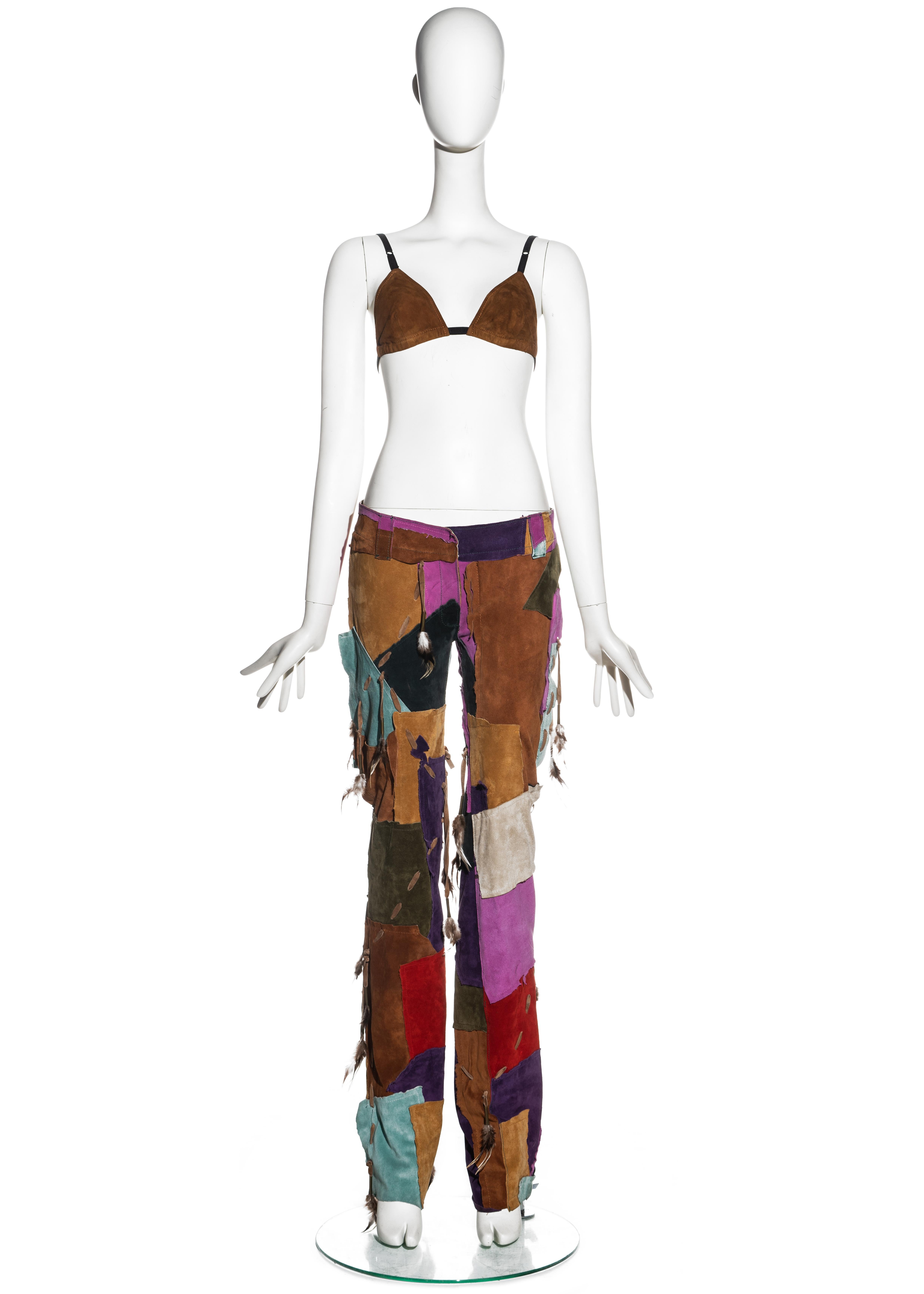 ▪ Dolce & Gabbana multicoloured pants and bra set
▪ 100% Leather
▪ Brown suede bra with adjustable shoulder straps 
▪ Multicoloured patchwork straight-leg pants 
▪ Decorative stitching detail with feathers 
▪ Labelled as a unique piece (Capo Unico);