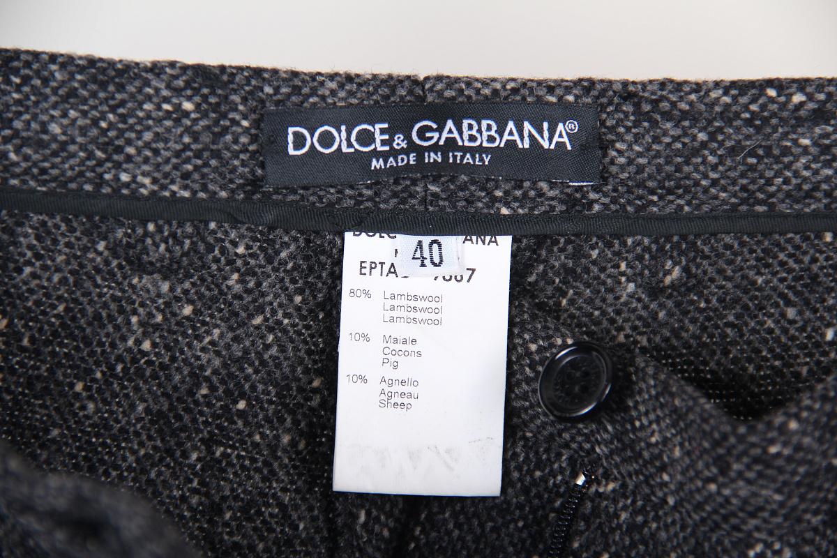 Dolce & Gabbana abito a corsetto in pelle di lana con pantaloni


Corsetto taglia 42.
Pantalone taglia 40, si prega di chiedere le misure.

Condizioni eccellenti.

Applicazioni in pelle.