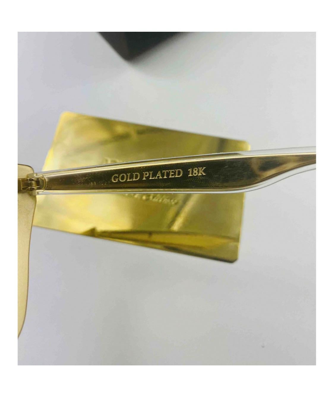 Donna Occhiali da sole Dolce & Gabbana con
lenti sfumate placcate oro in vendita