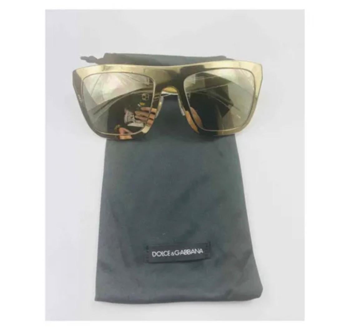 Women's Dolce & Gabbana Sunglasses with
gold-plated gradient lenses For Sale