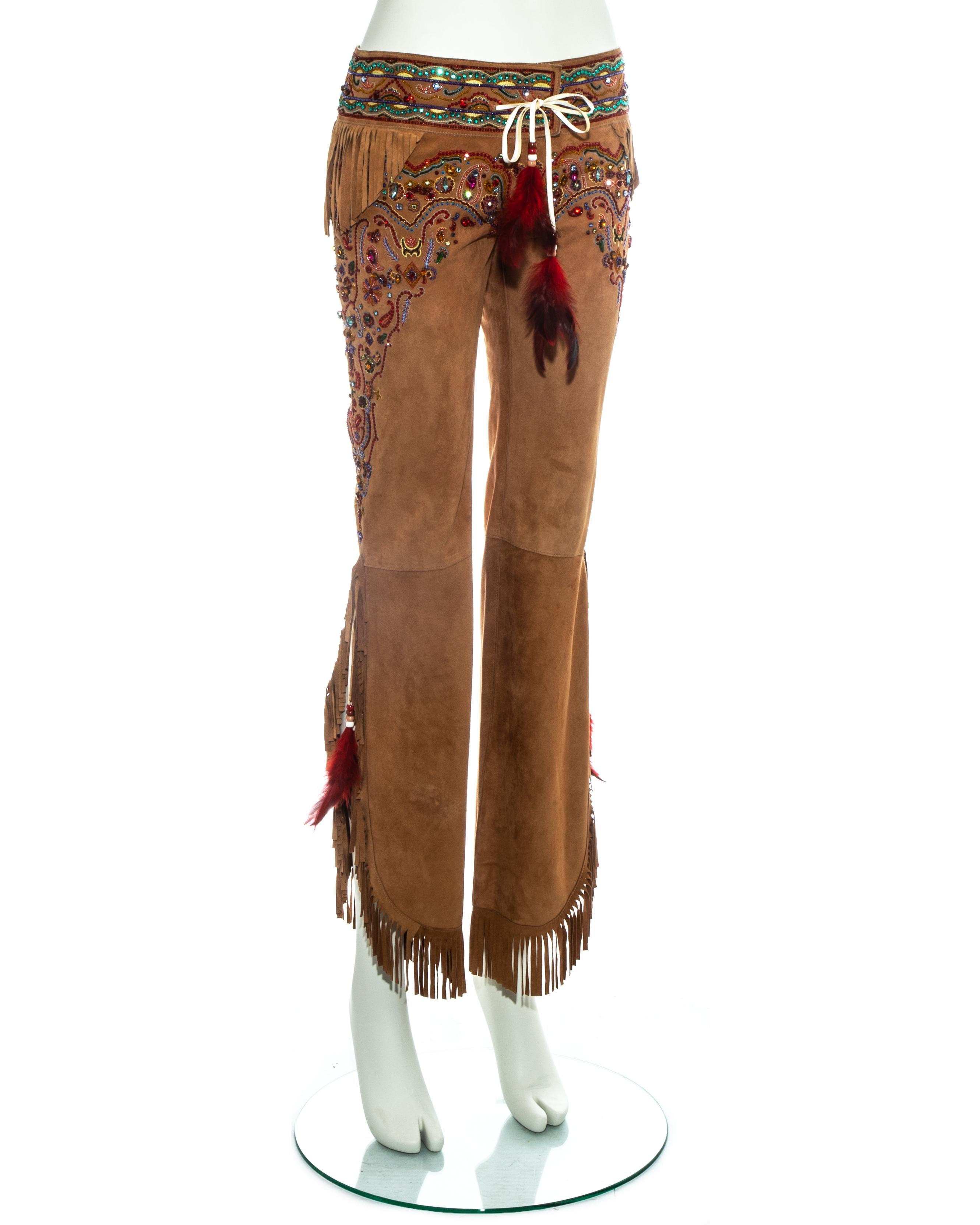 Dolce & Gabbana tan leather fringed pants with western style embroidery and embellishments.

Spring-Summer 2001