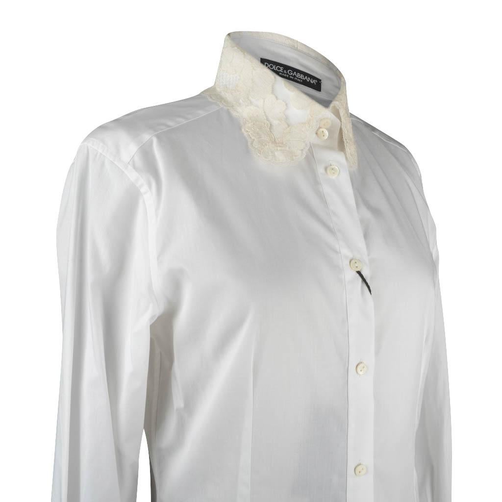 Dolce & Gabbana classic white button down shirt.  
Classic Dolce cut white shirt with stretch and fabulous shaping.
Collar and cuffs are detailed with ecru lace - the effect is divine.
Rear has signature center pleat. 
Classic chic. 
NEW or NEVER