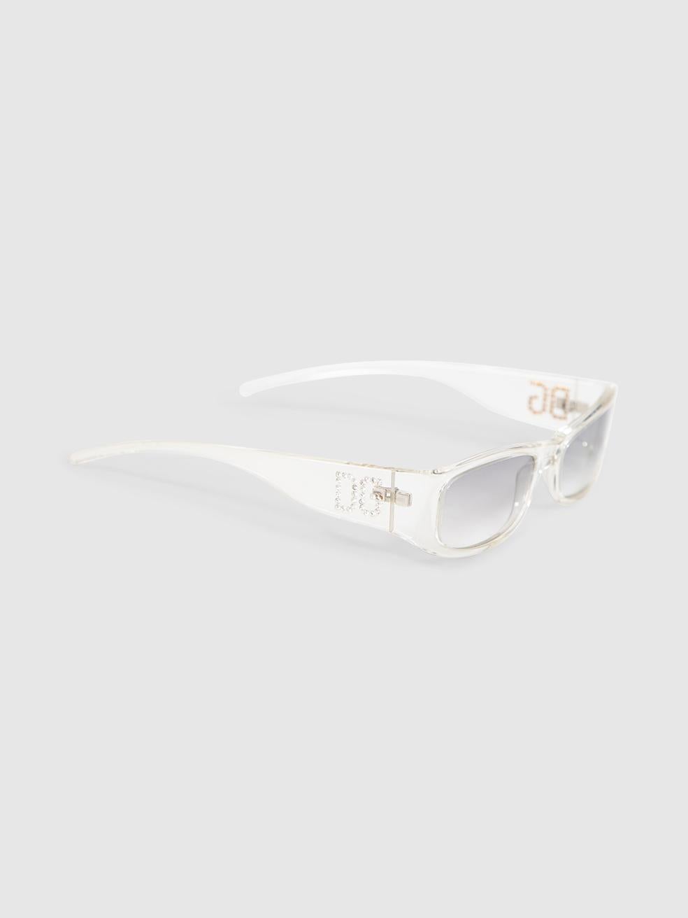 CONDITION is Very good. Minimal wear to sunglasses is evident. Minimal wear to one gem on the right arm on this used Dolce & Gabbana designer resale item.
 

 

 

 Details
 

 

 Model: DG 494S
 

 Transparent
 

 Acetate sunglasses
 

 Gradient