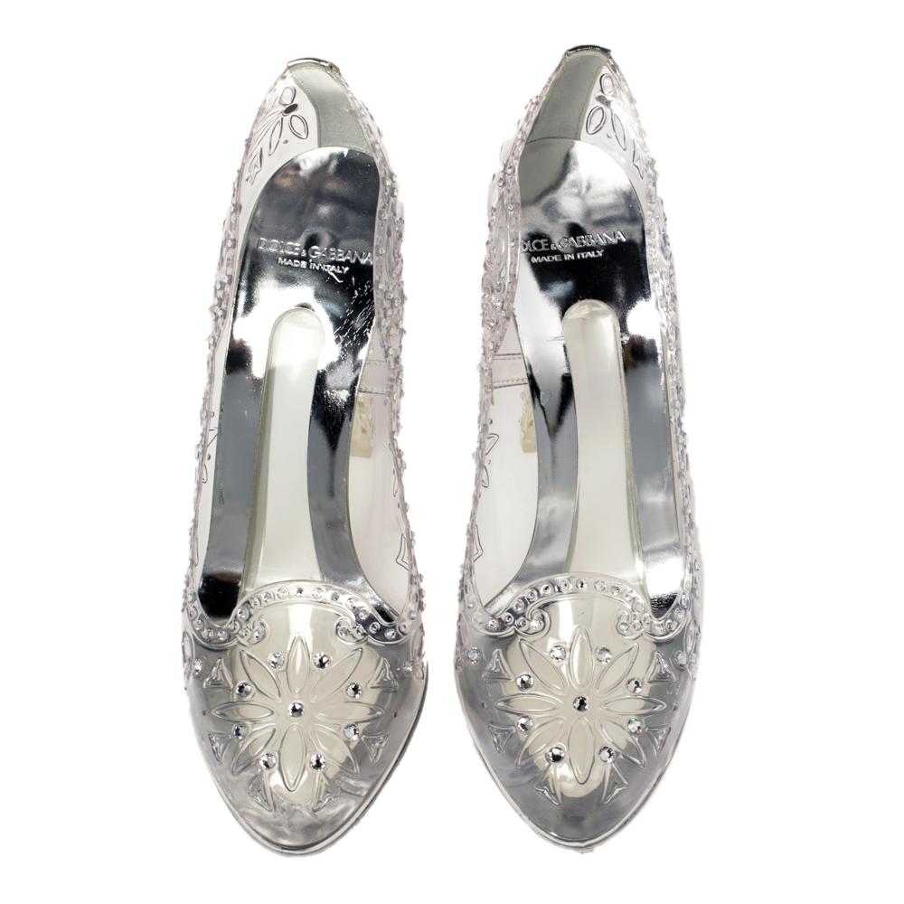 Chic, contemporary, and very dreamy, these Cinderella pumps from Dolce & Gabbana are sure to make you the center of attraction and win every possible praise. The transparent, glass-like pumps are crafted from PVC and are creatively decorated with